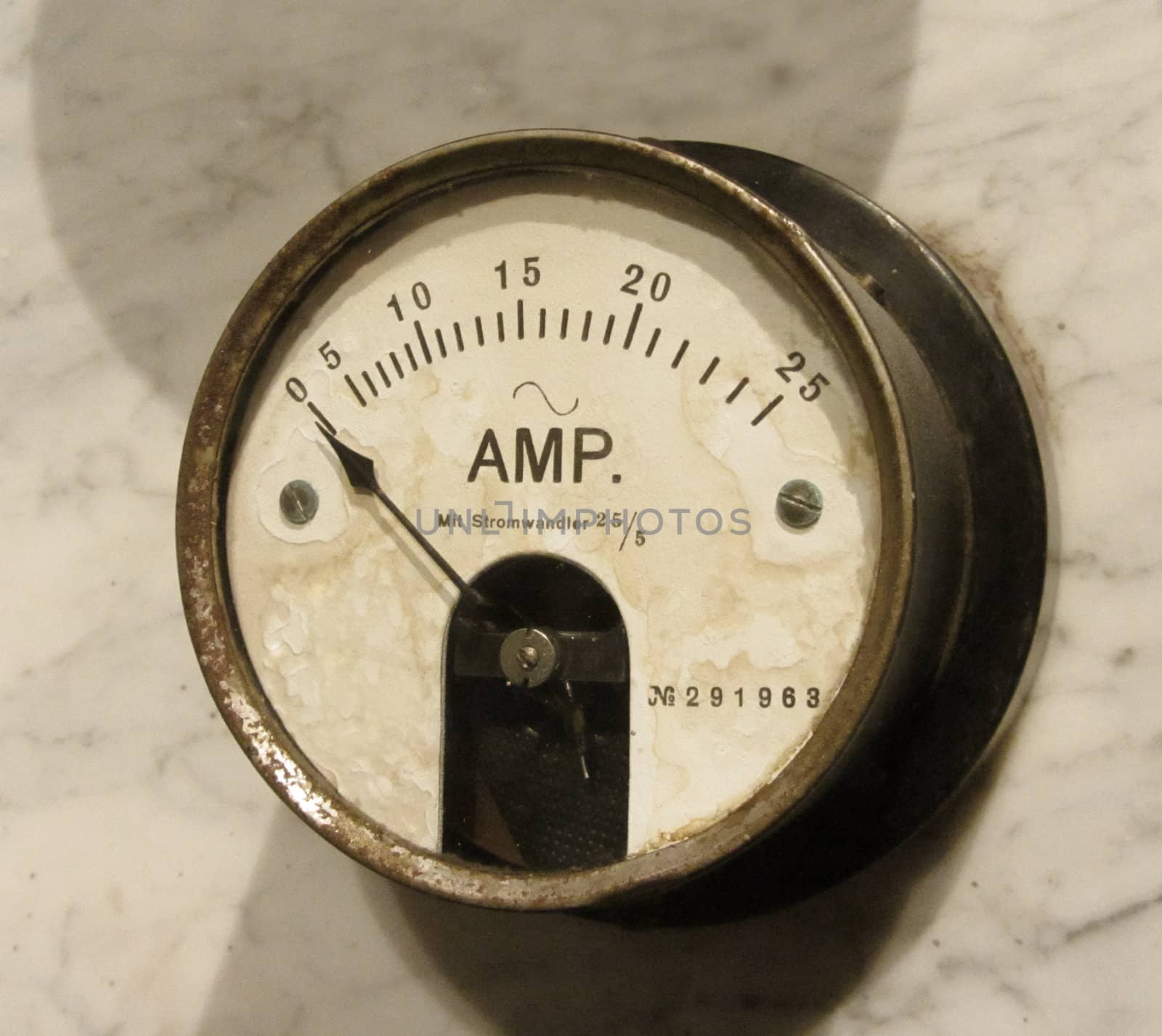 Vintage amper-meter closeup, old electric instrument technology