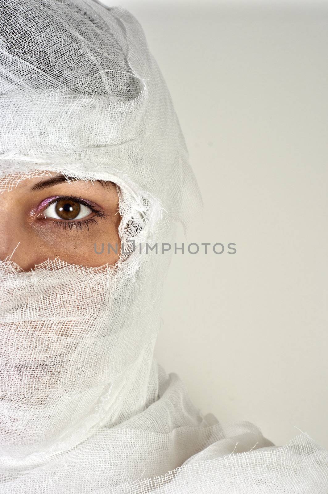 Girl after accident against white isolated background