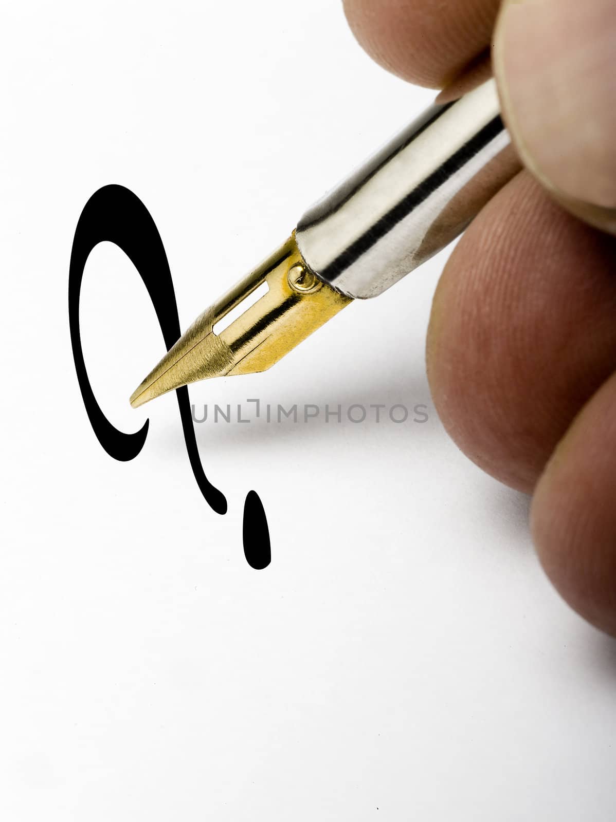 pen writing a question mark on a white page
