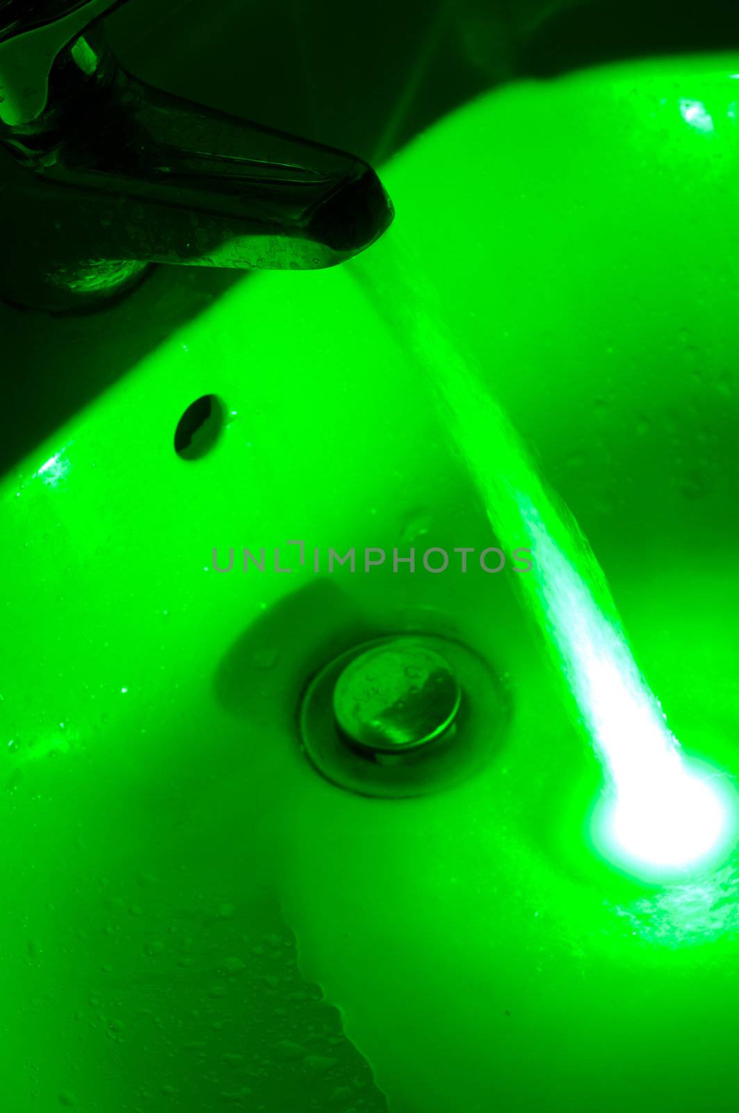 Green glowing water flow