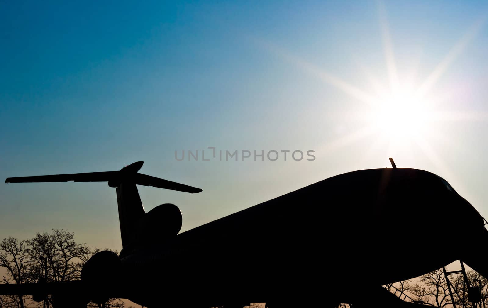 Silhouette of a landed airplane