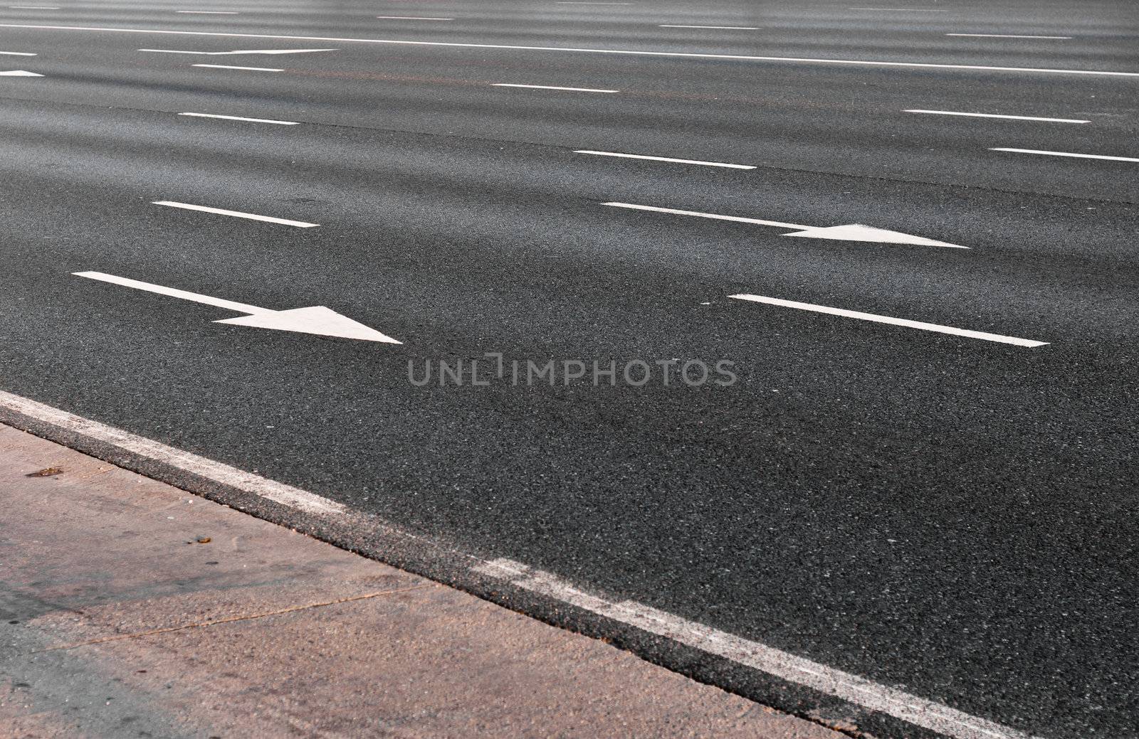 Arrow direction on asphalt