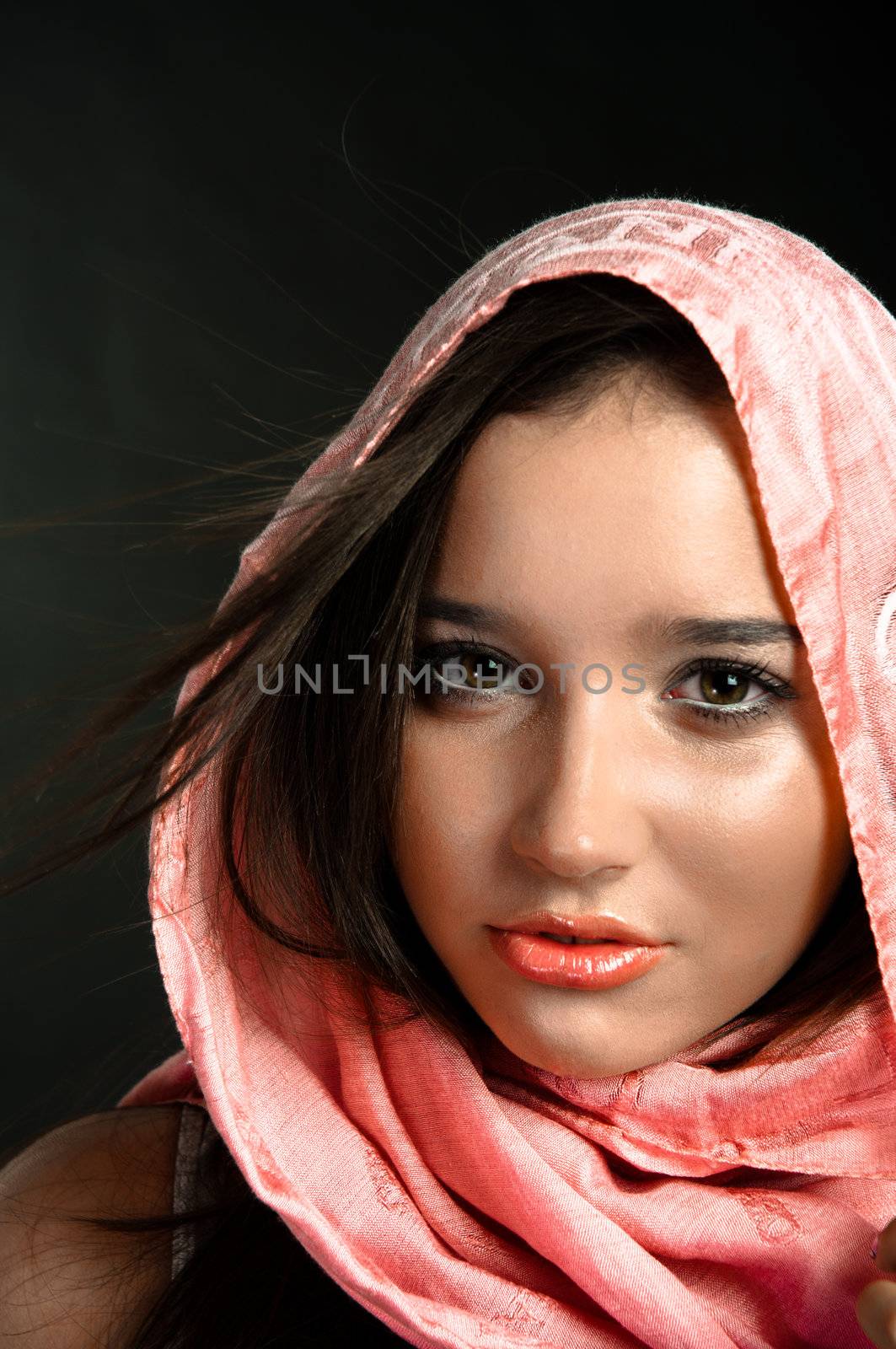 Closeup of a beautiful girl in scarf by svedoliver