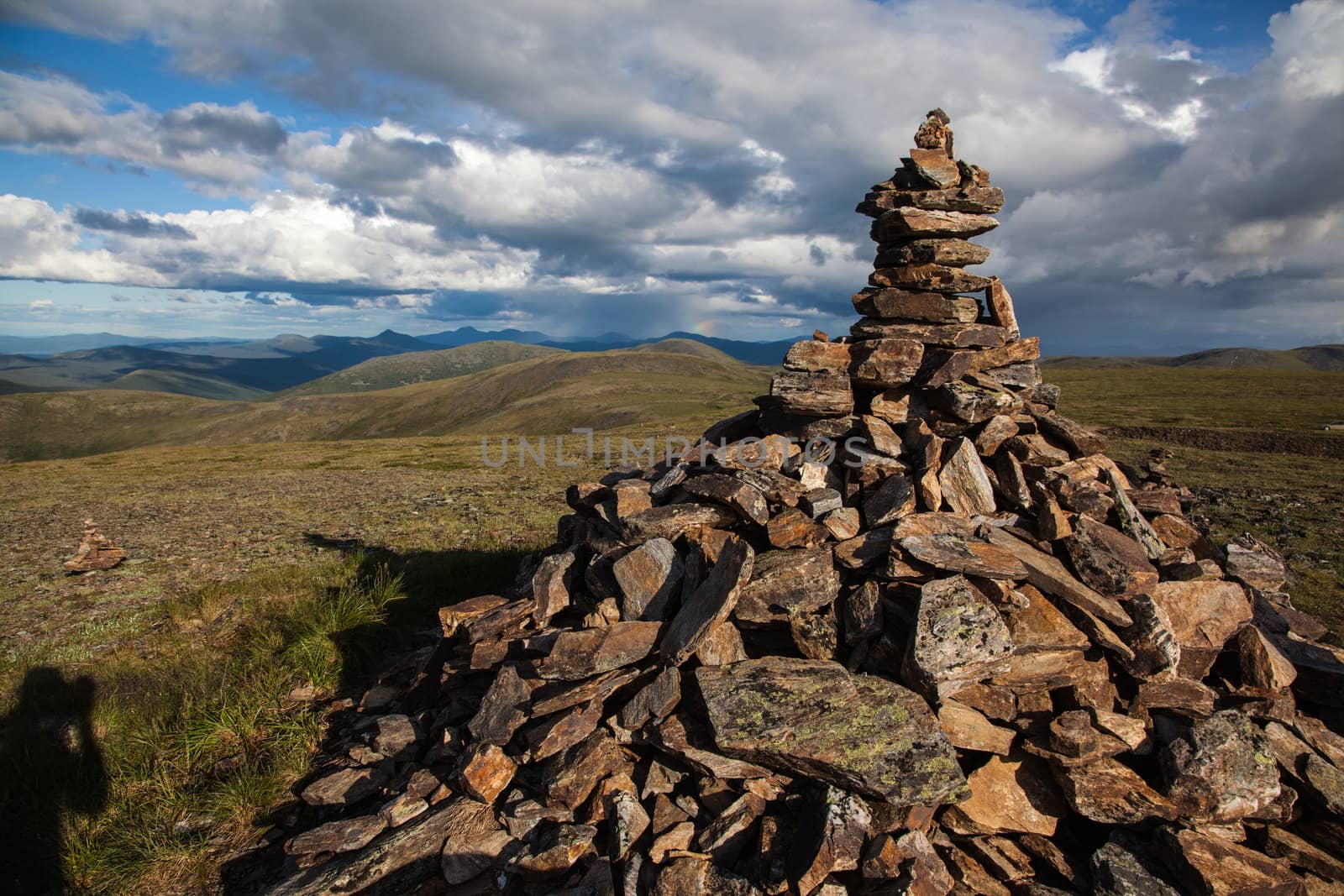 Rock cairn overlooking high alpine tundra