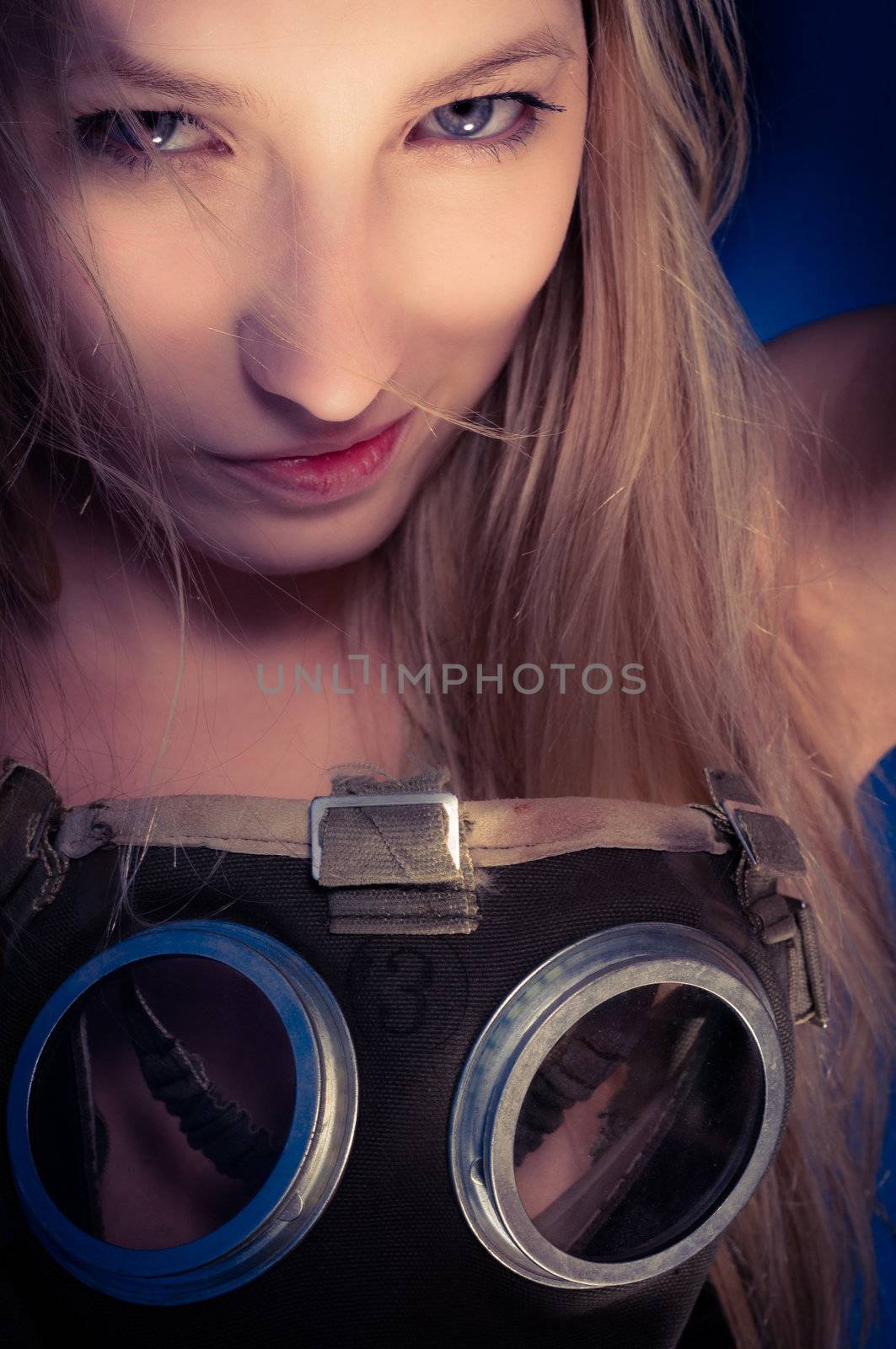 Young woman with a mask closeup