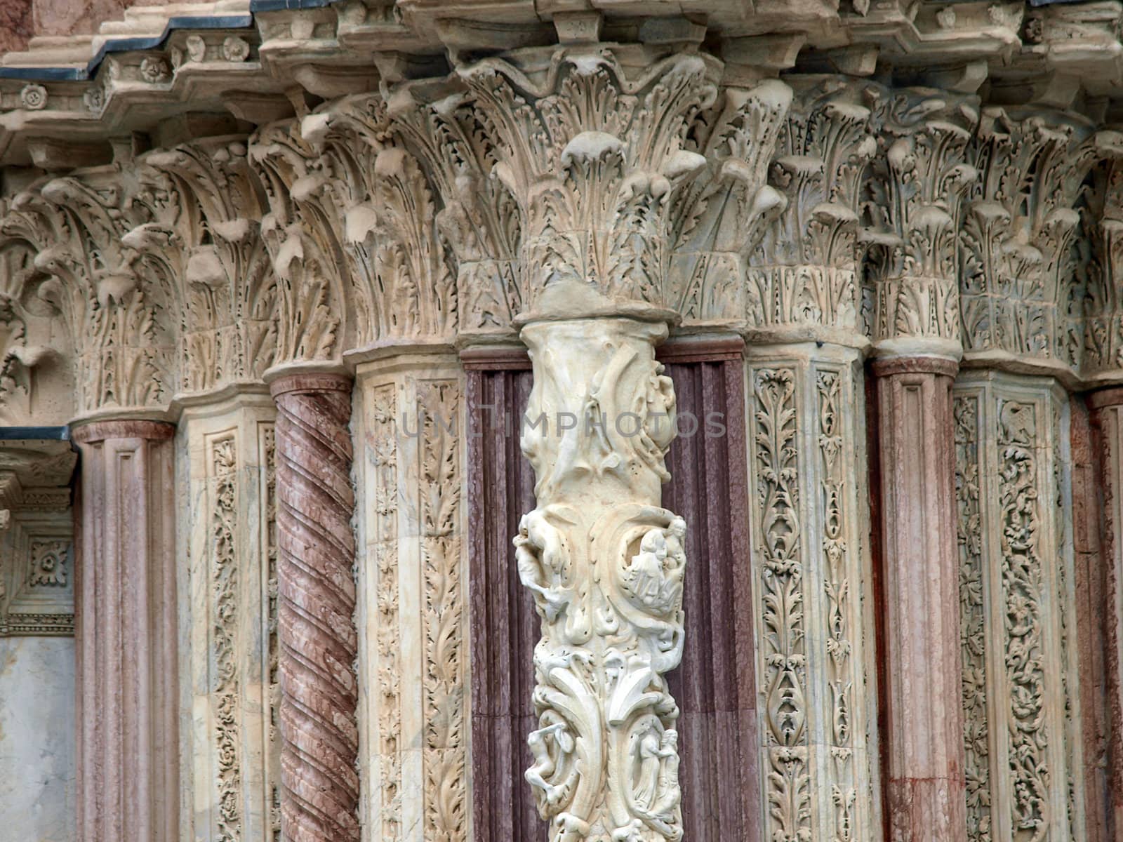 Architectural details of Duomo facade - Siena,Tuscany,Italy. The Duomo of Siena, which was built in the 12th and 13th centuries, is one of the prettiest churches in Gothic style in Italy