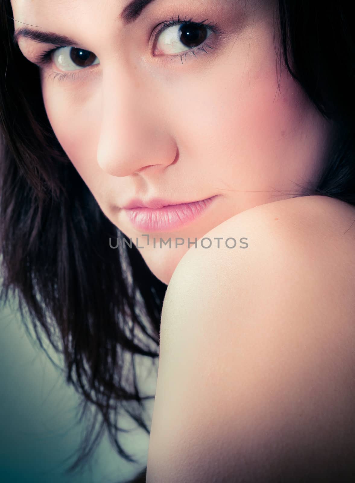 Closeup of a beautiful girl against isolated background