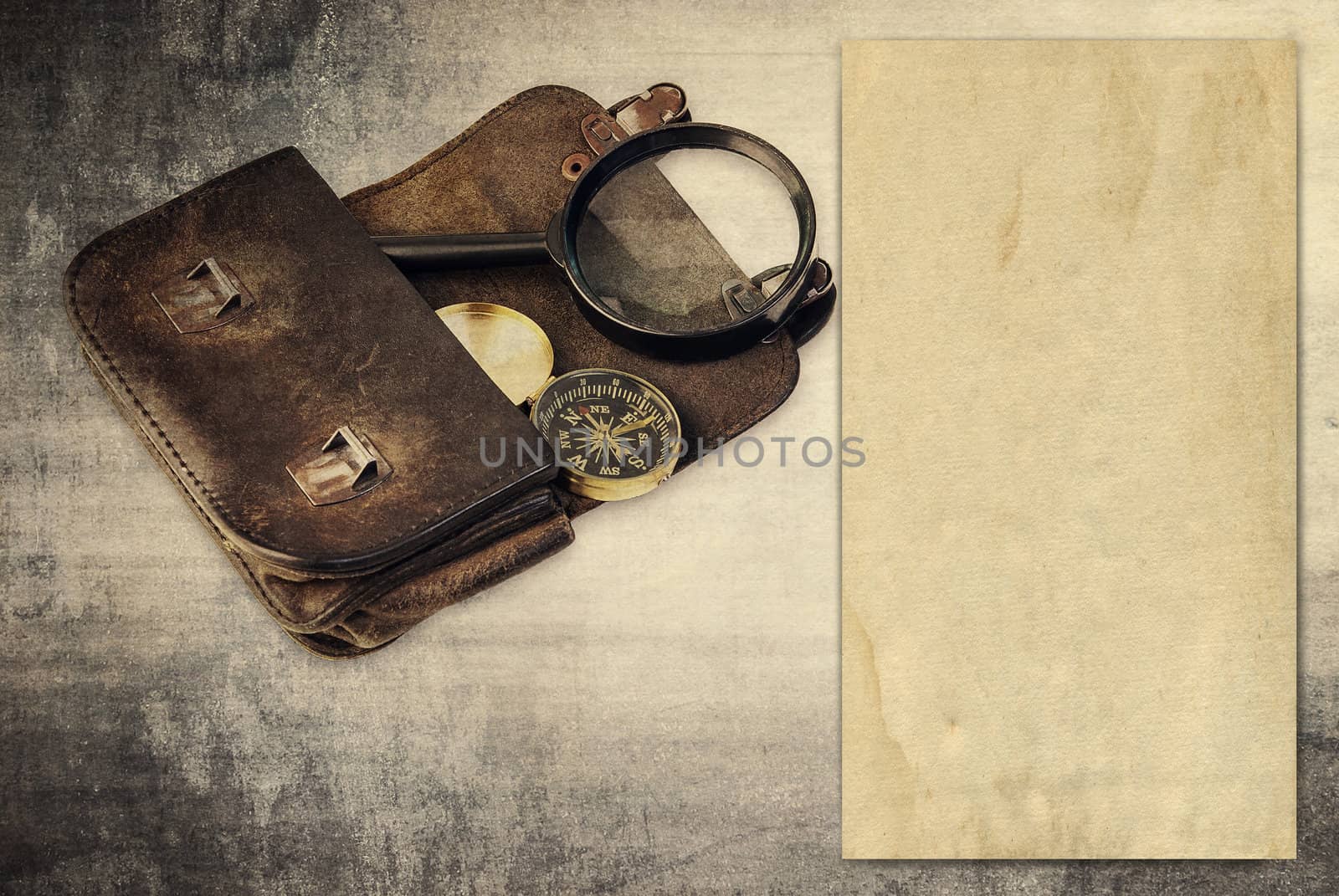 Vintage background with old paper, wallet and compass