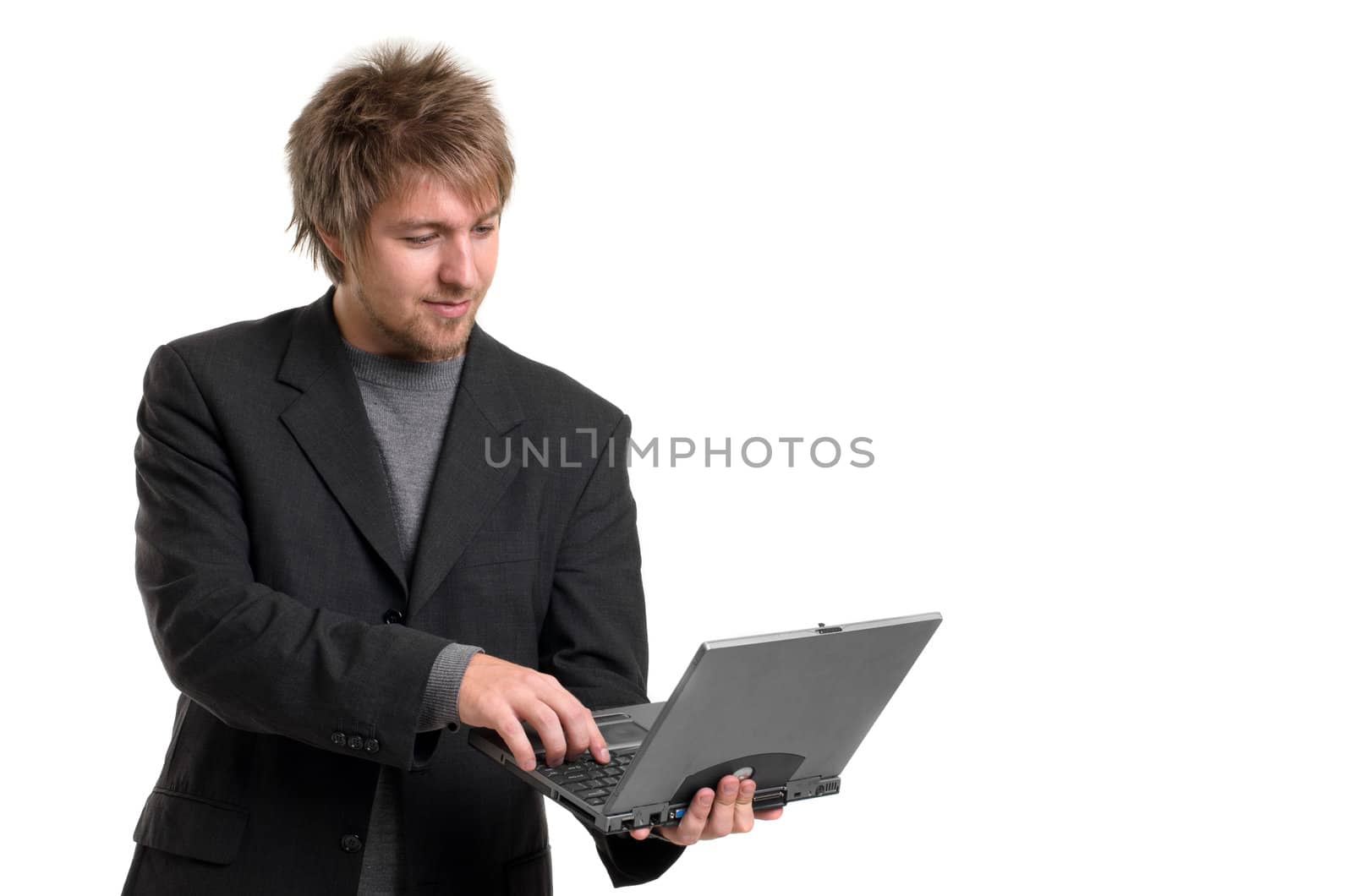 Young man in business suit against white background