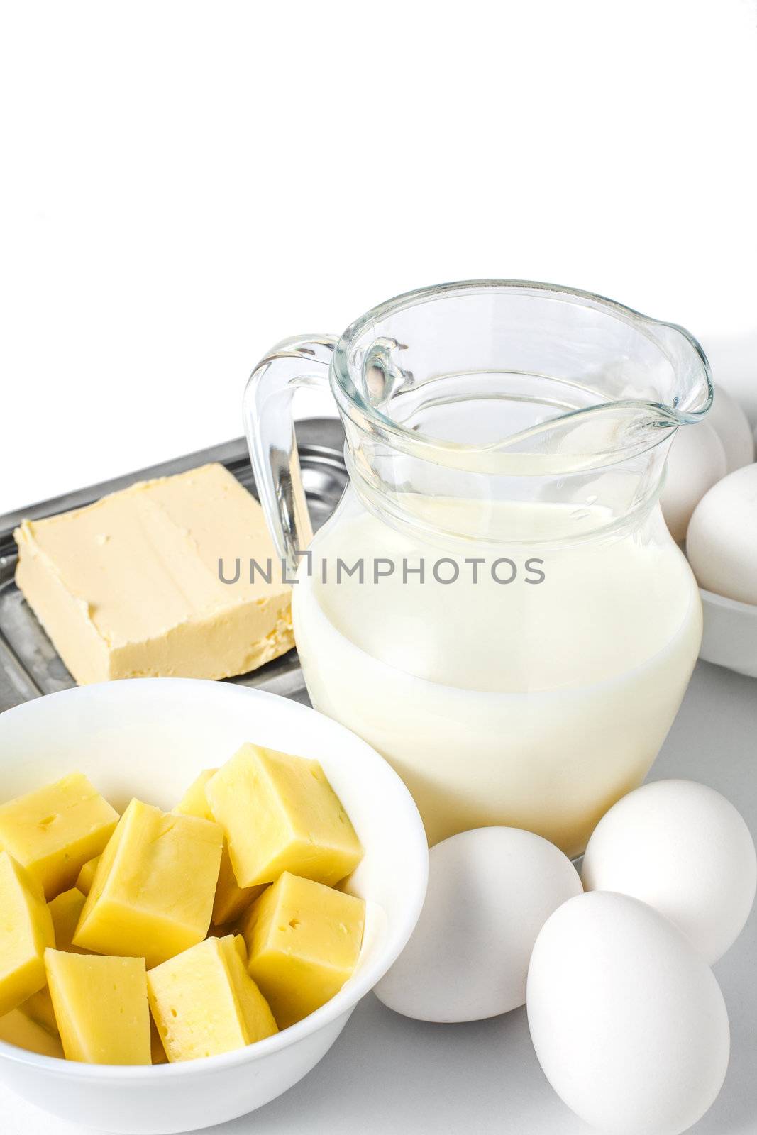 Fresh dairy products on white background by anelina