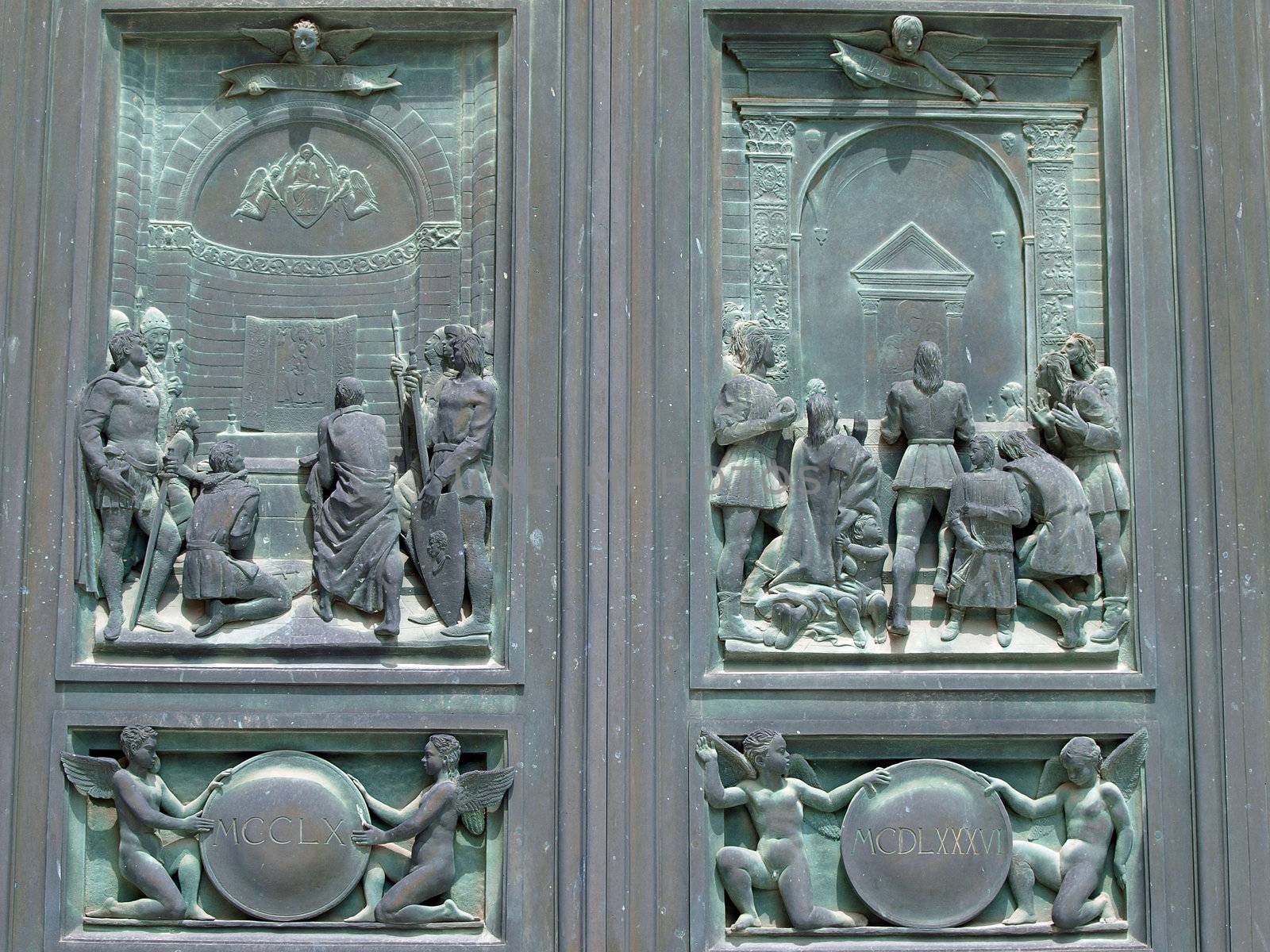 Siena - Duomo. Beautifully decorated bronze doors