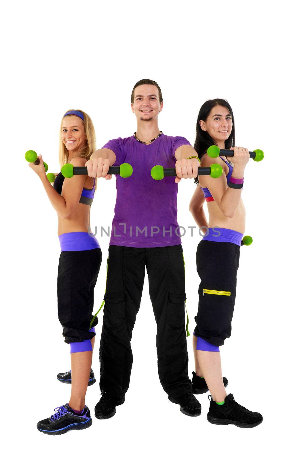 Young Fitness Instructors against white background in studio