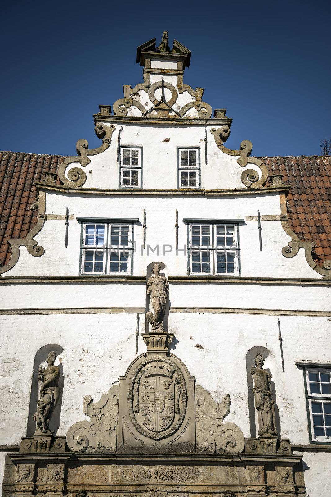 Closeup of gatehouse in Husum on a sunny day in spring