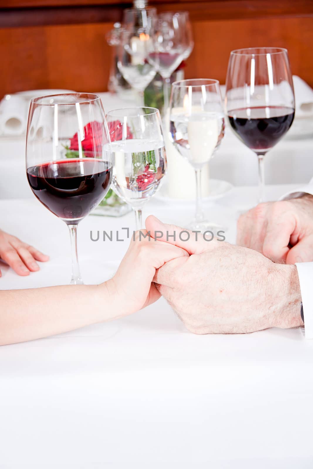 happy smiling couple in restaurant celebrate toast champagne dinner