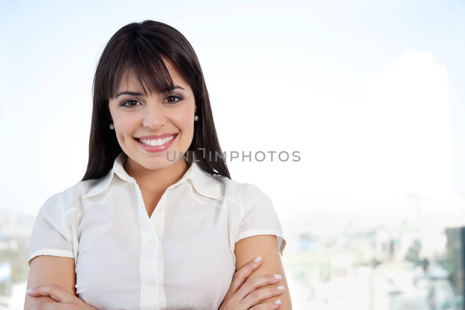 Attractive Smiling Businesswoman by leaf