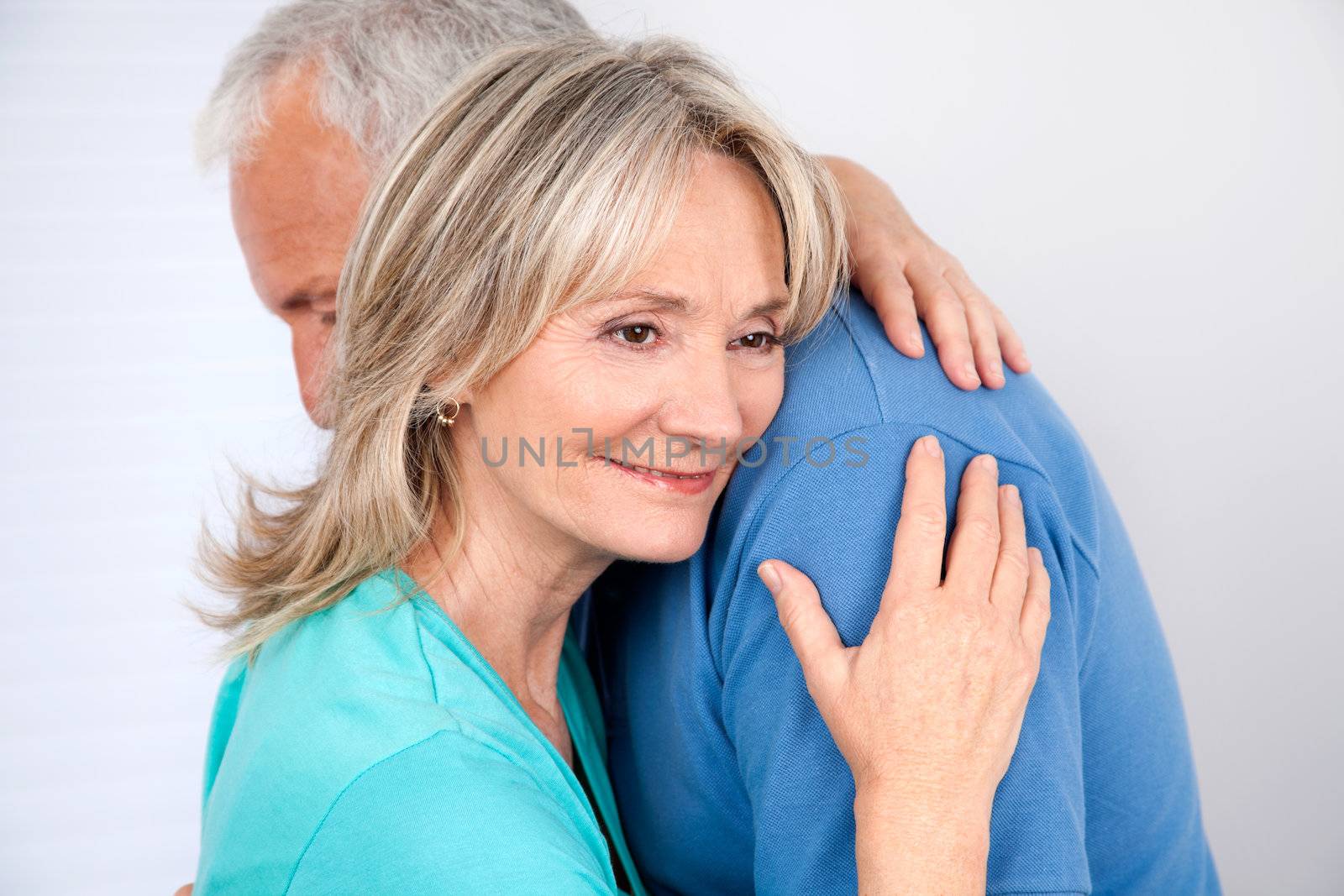 Couple Embracing by leaf