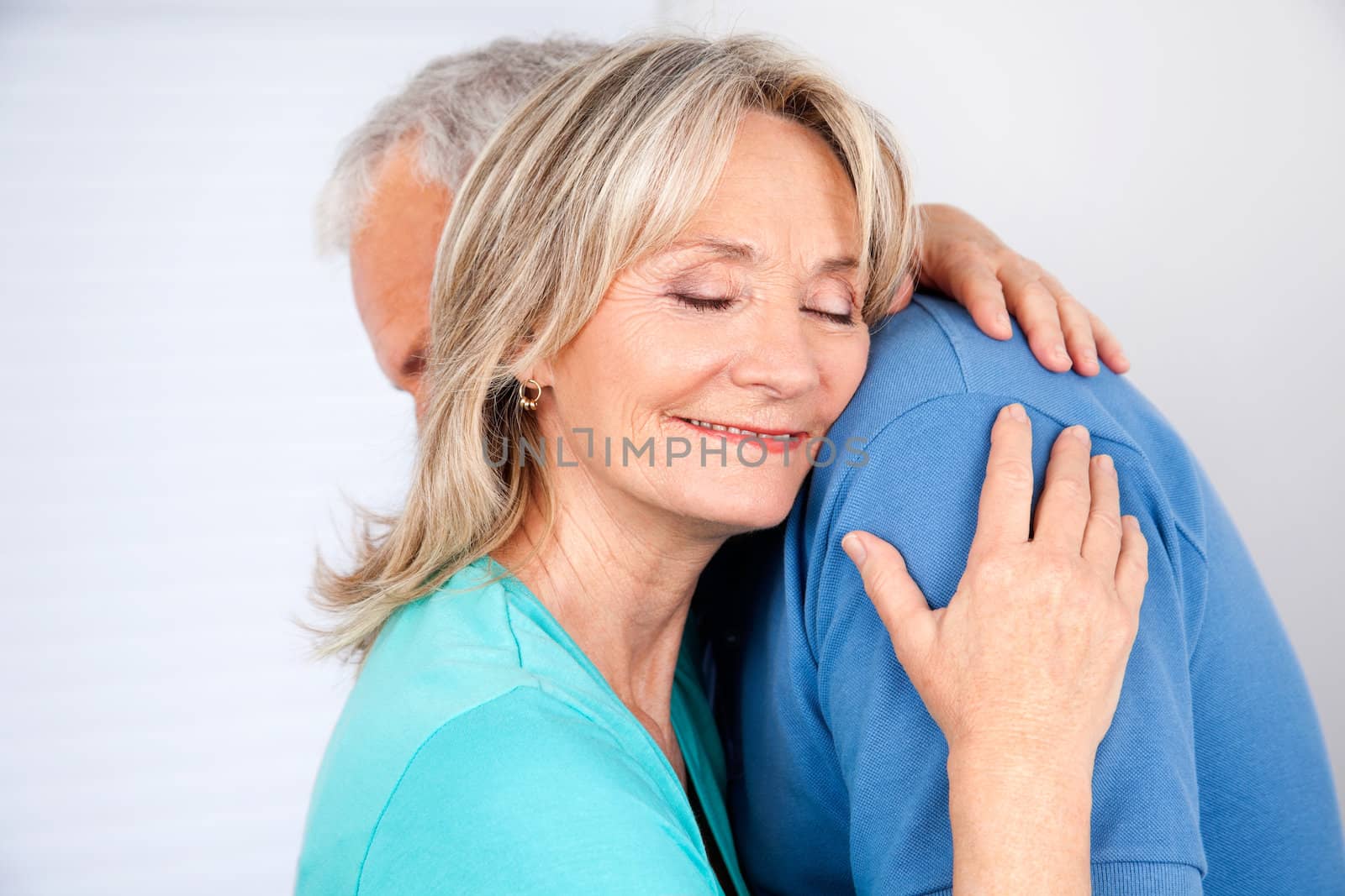Wife Hugging Her Husband by leaf