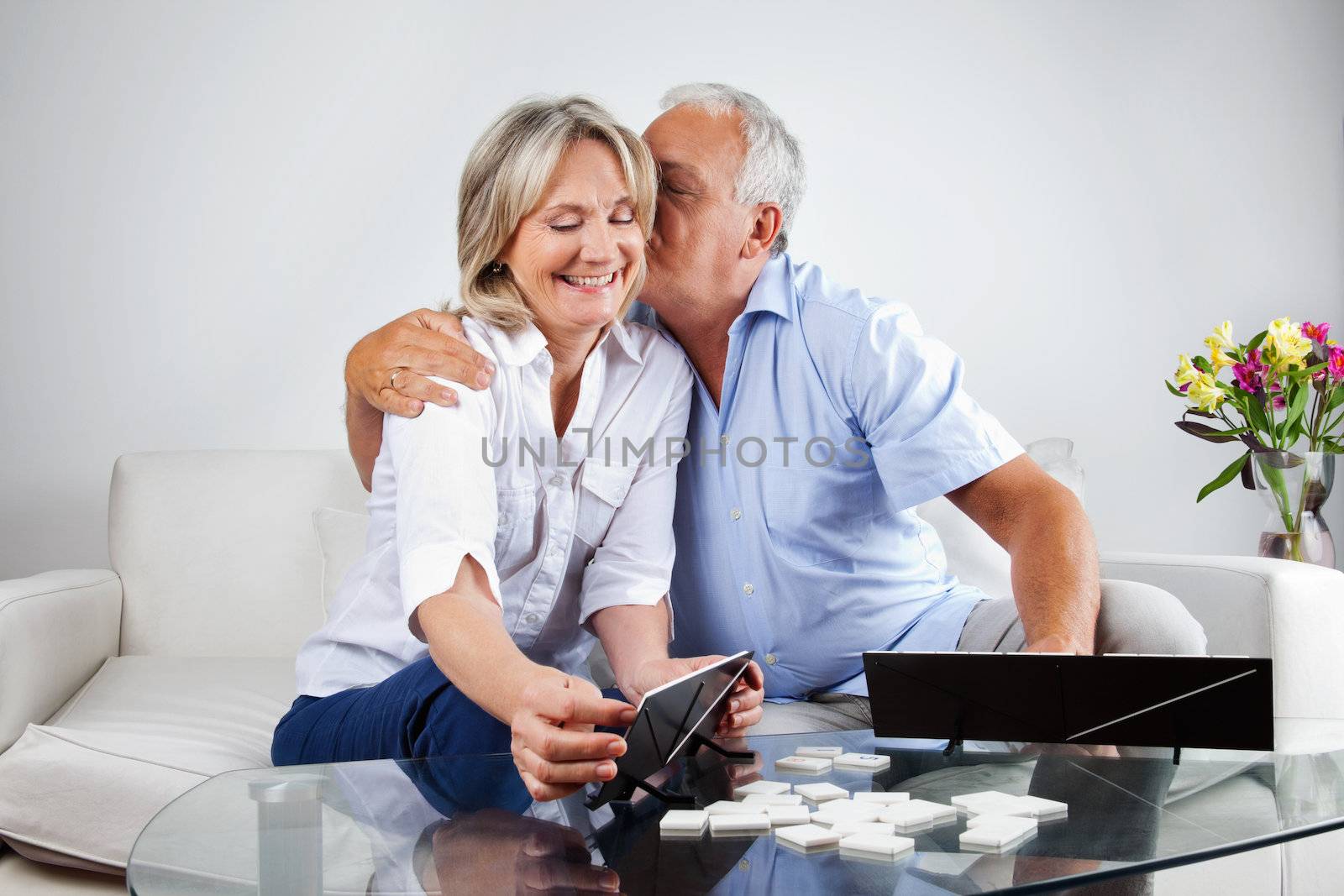 Elderly Couple Playing Games by leaf