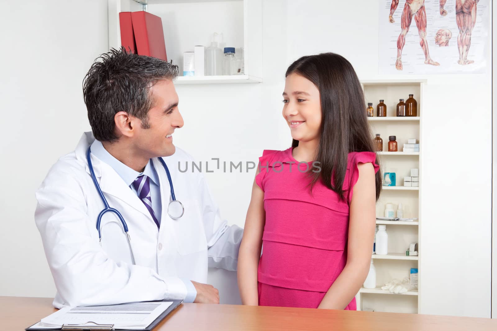 Doctor with Young Child Patient by leaf