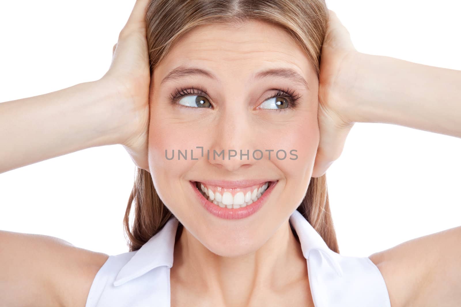 Young woman covering ears with hand isolated on white background.