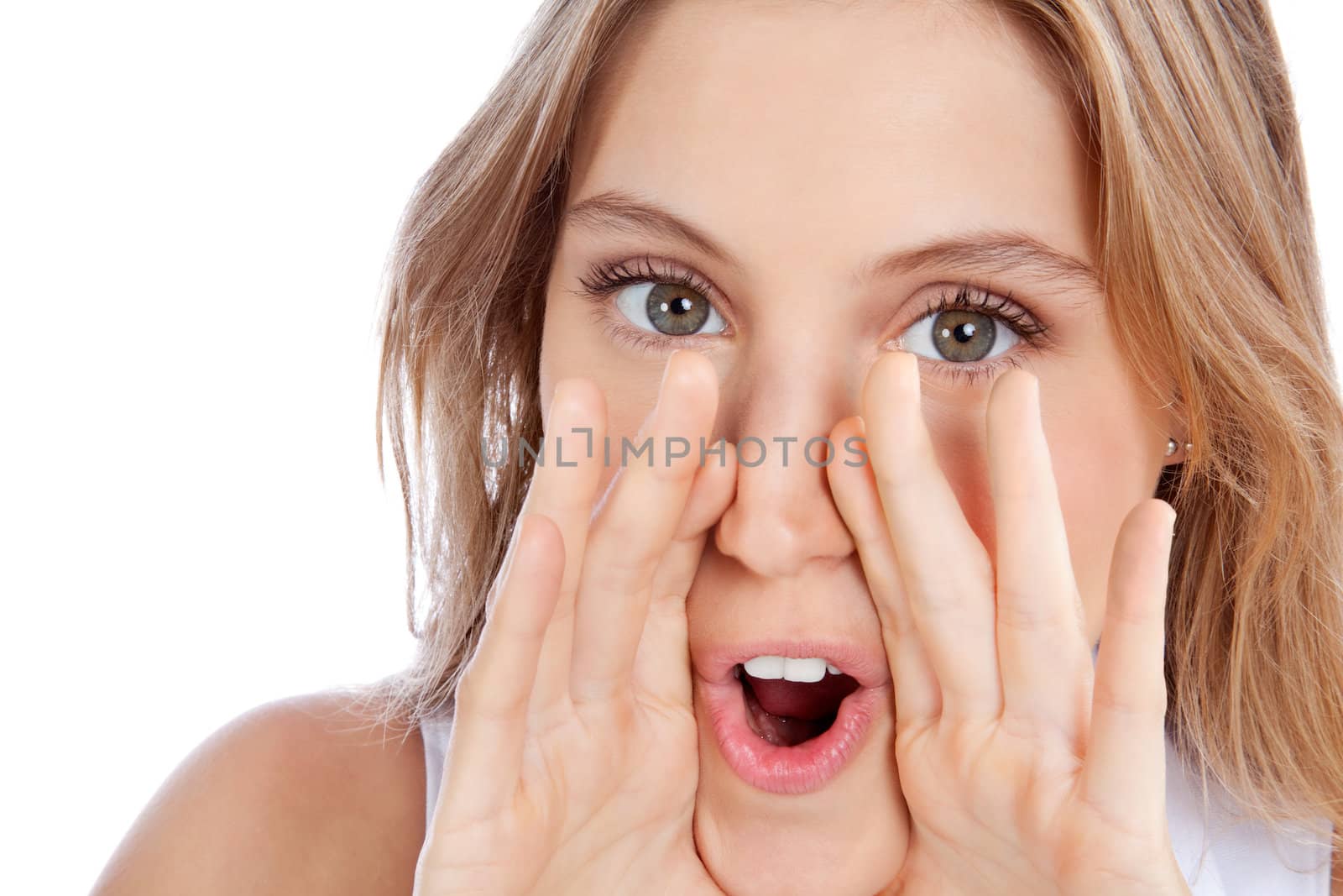 Young woman yelling isolated on white background.