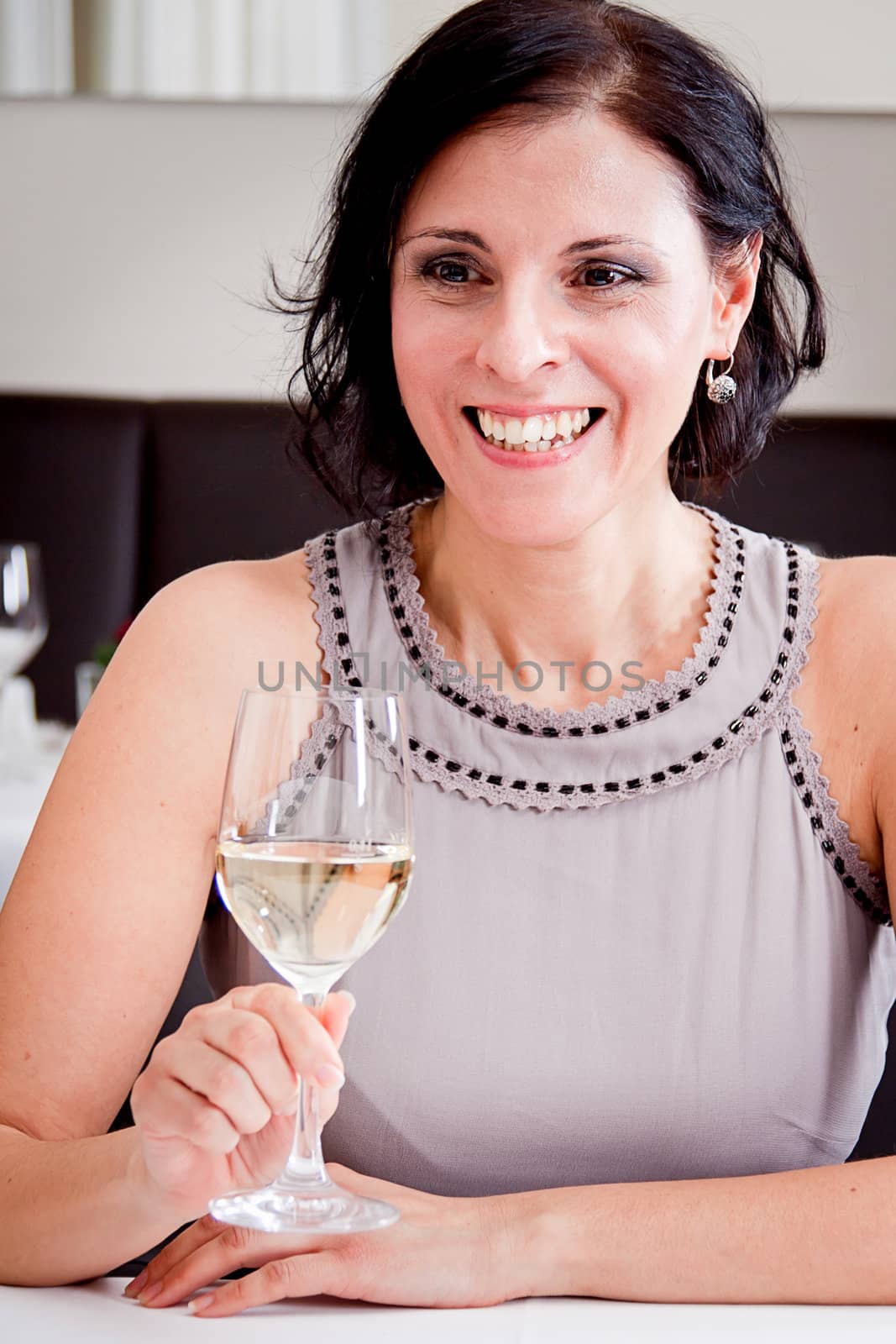 happy smiling couple in restaurant celebrate toast champagne dinner