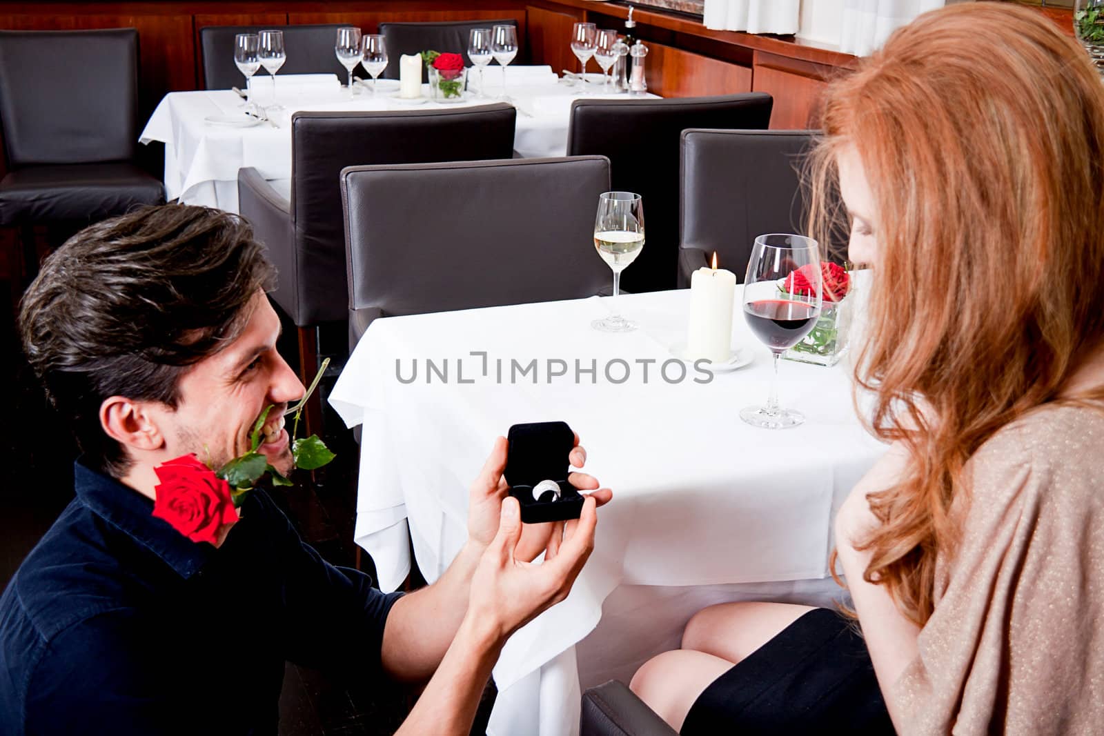 happy couple in restaurant romantic date love dinner valentines day wedding