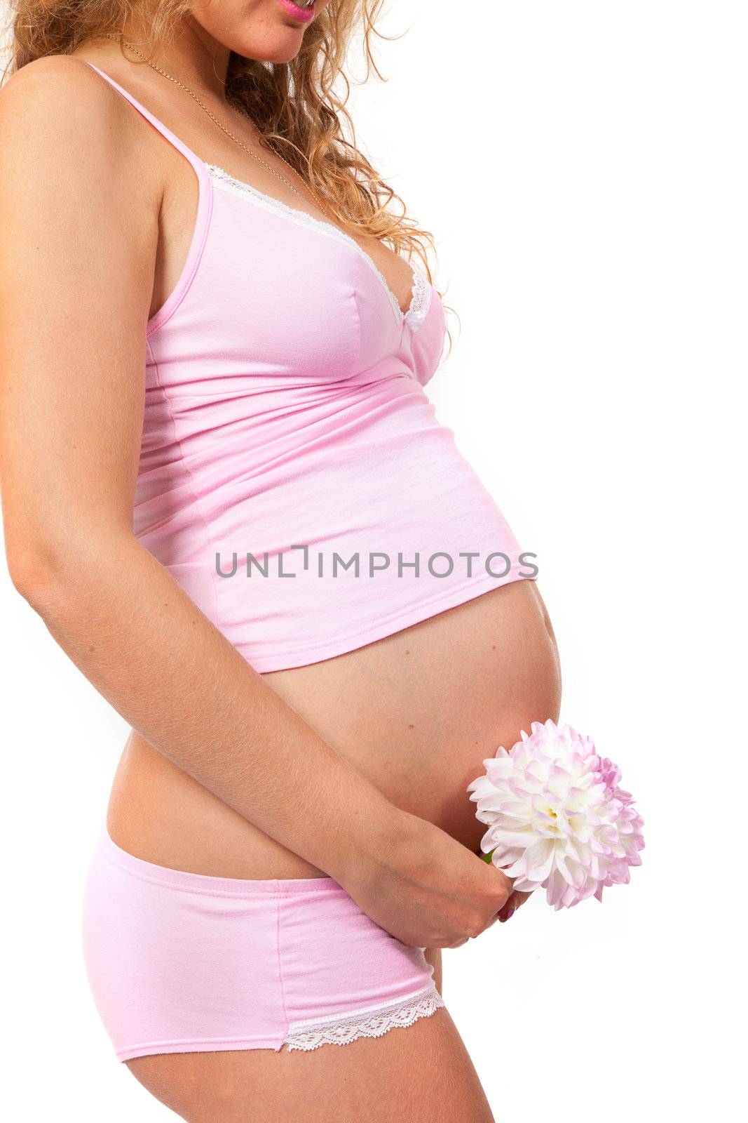 Pregnant woman is caressing her belly by bloodua