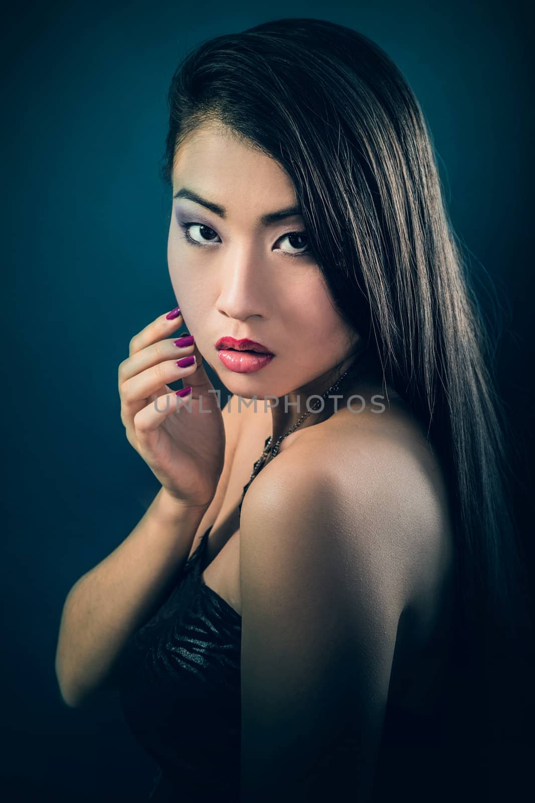 Beautiful brunette Asian woman with long black hair by bloodua