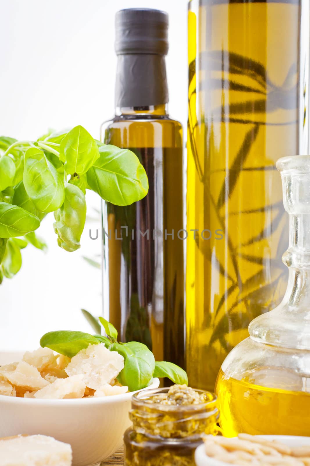 tatsty geen olives parmesan and olive oil ingredients vegetarian food
