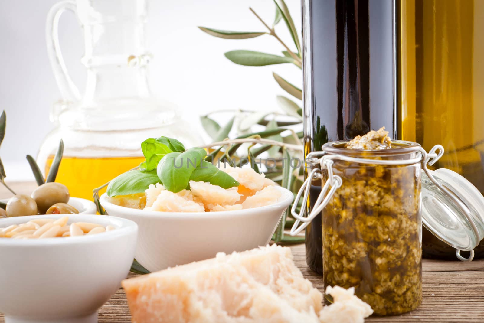 tatsty geen olives parmesan and olive oil ingredients vegetarian food