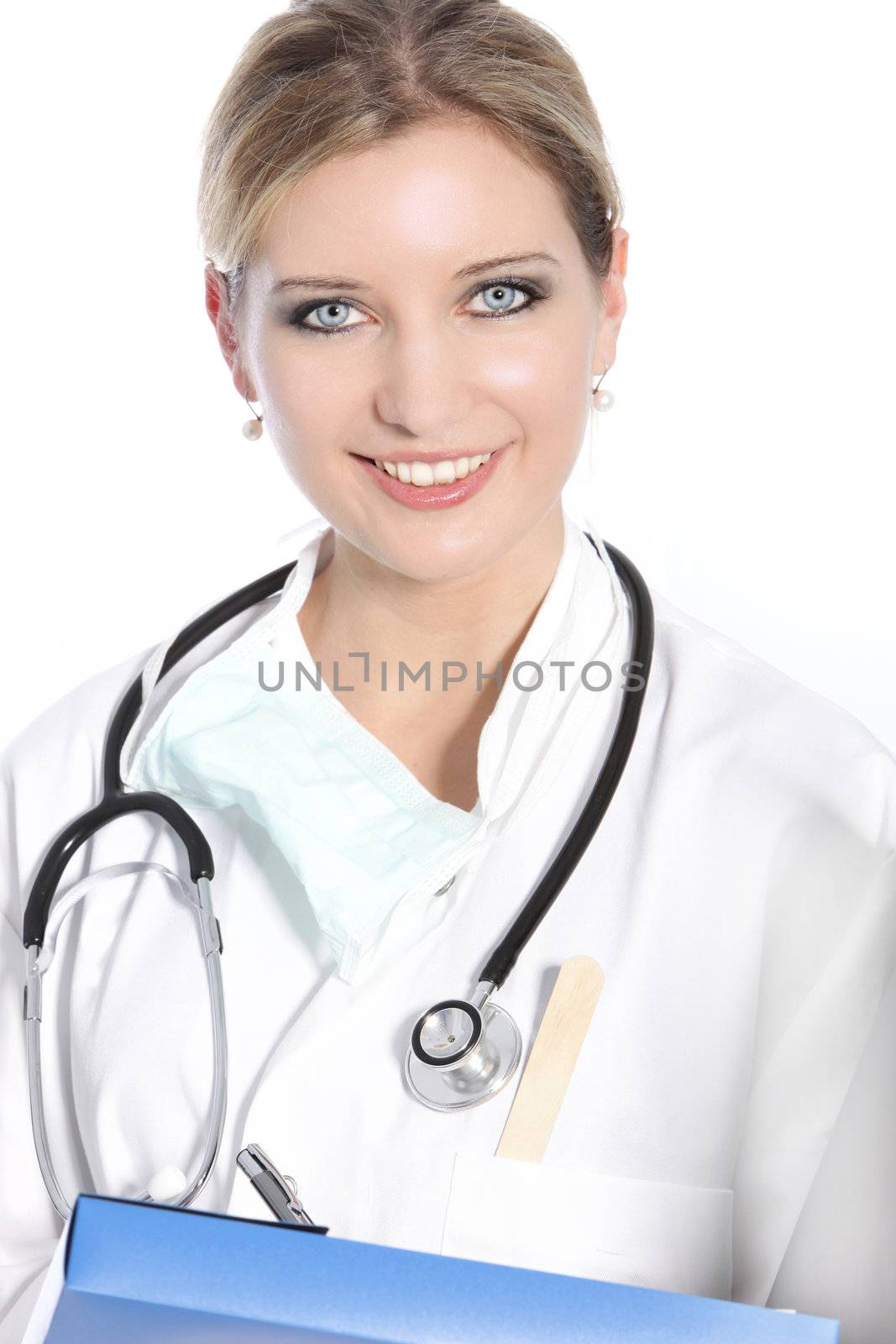 Smiling attractive young female nurse or doctor with a stethoscope around her neck carrying a file, head and shoulders studio portrait on white