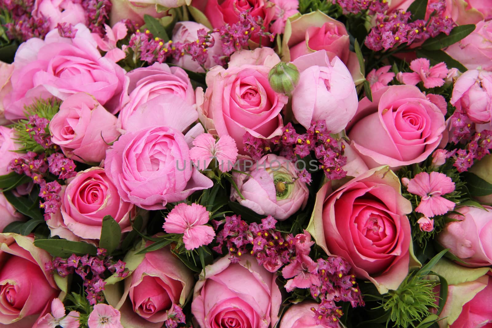 Floral arrangement in different shades of pink for a wedding