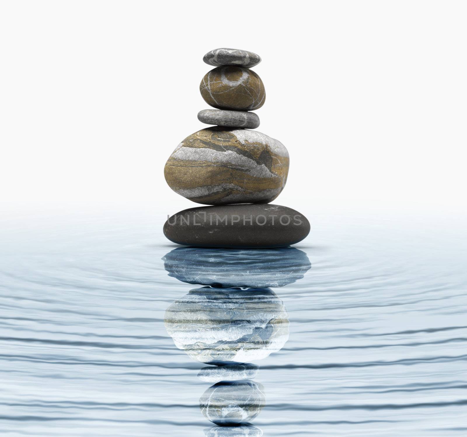 Zen stones in water by pbombaert