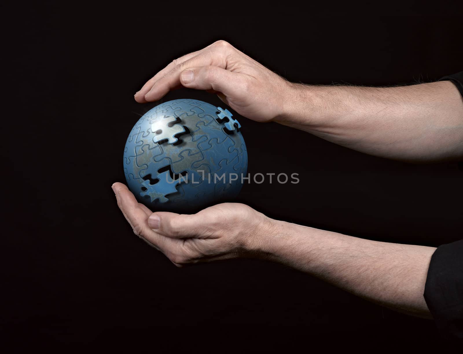 Man holding a glowing earth globe in his hands.