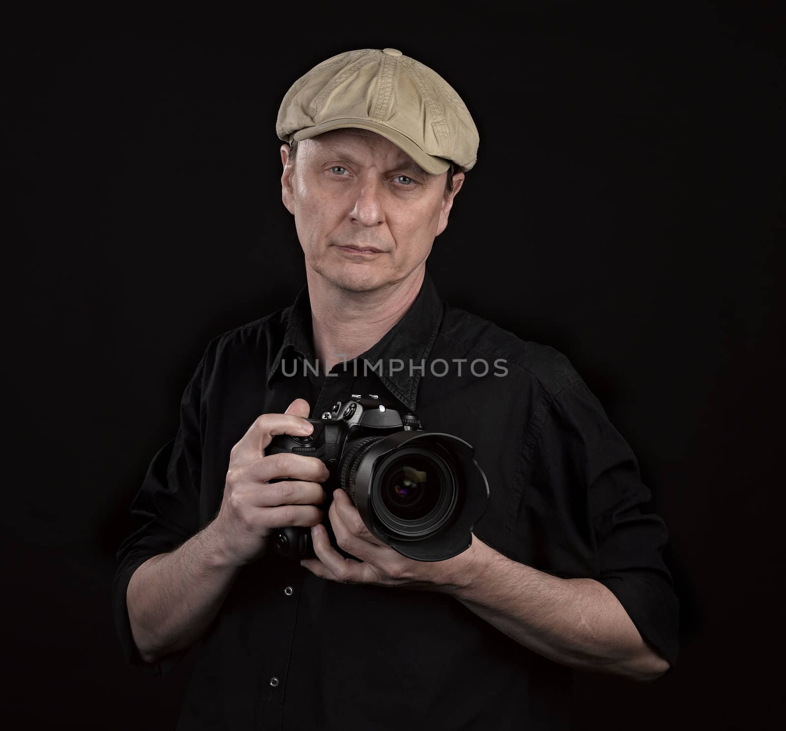 Portrait of a Photographer on black