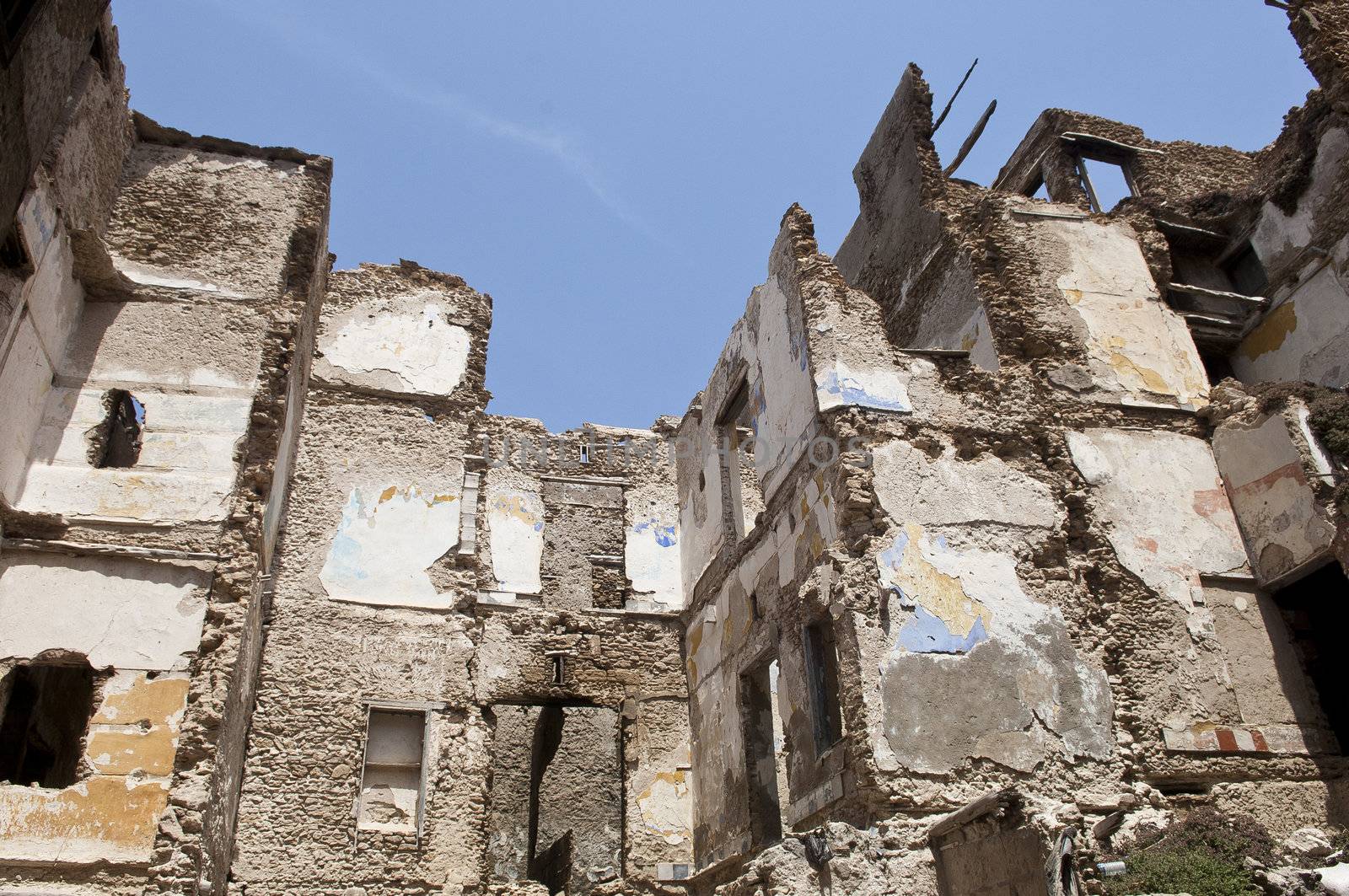 Destroyed building, demolition, earthquake, bomb, terrorist atta by pbombaert