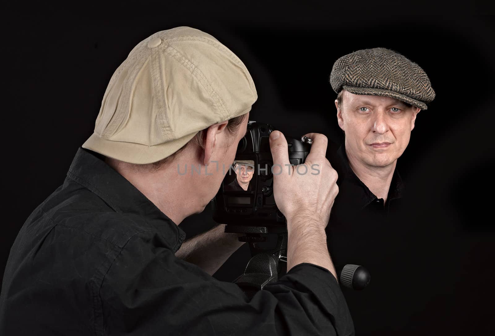 Portrait Photographer with camera by pbombaert