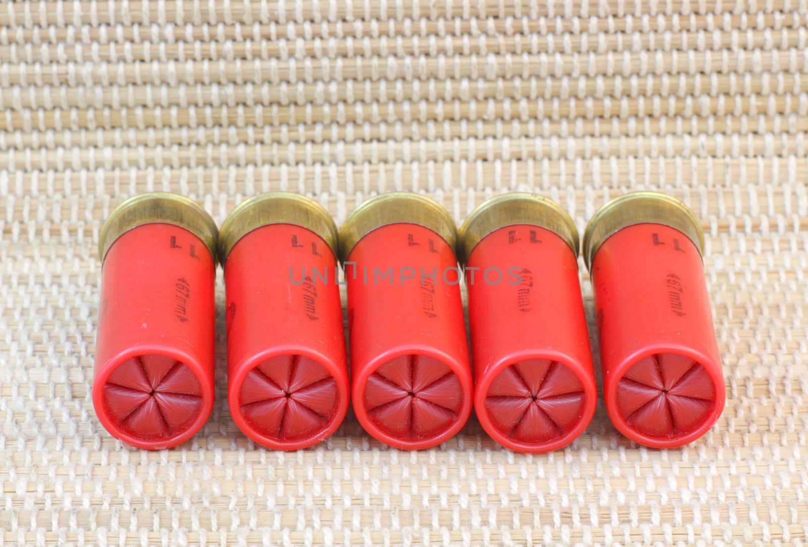 five red shotgun cartridges 11 