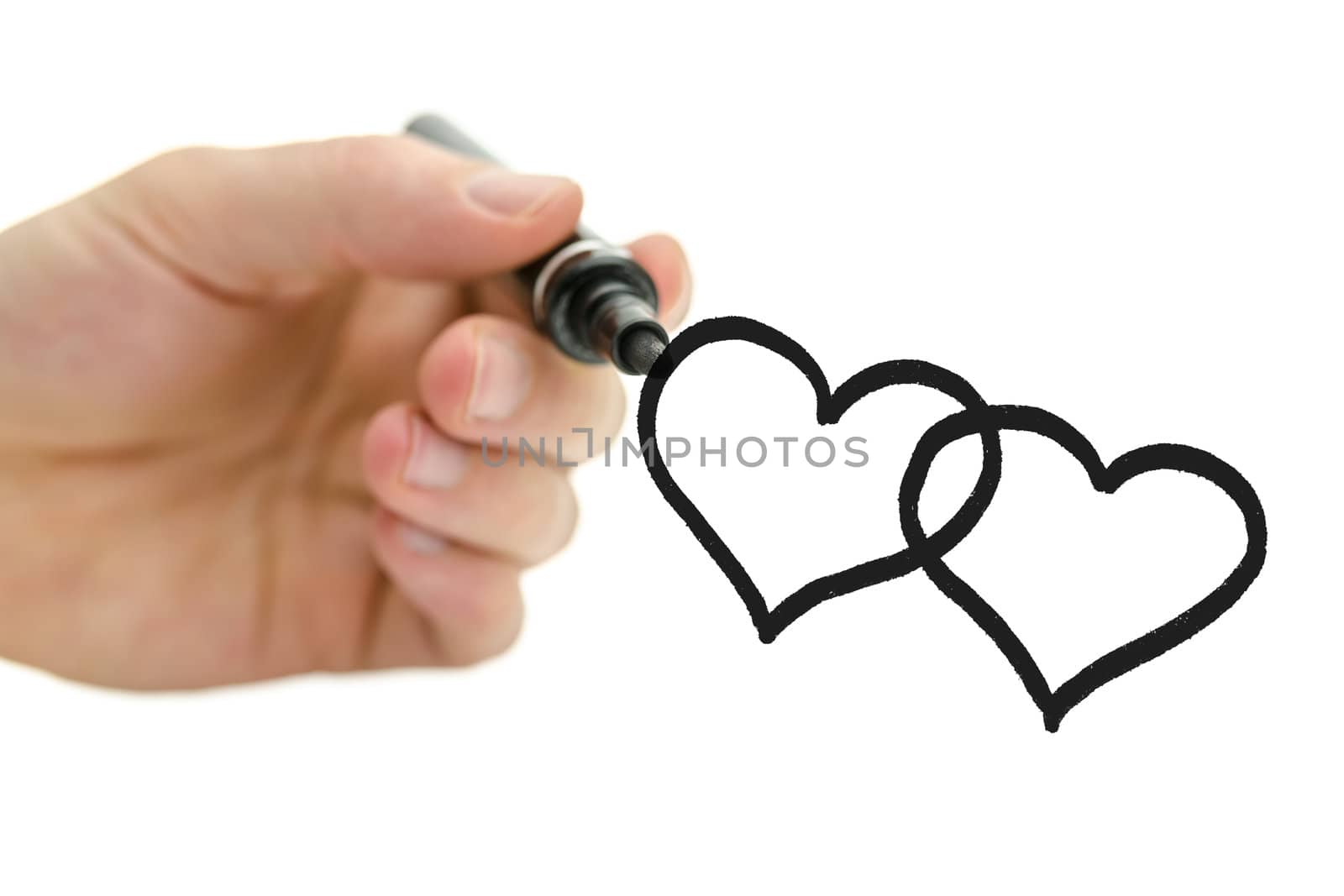 Closeup of male hand drawing two connected hearts on a virtual glass board. Over white background.
