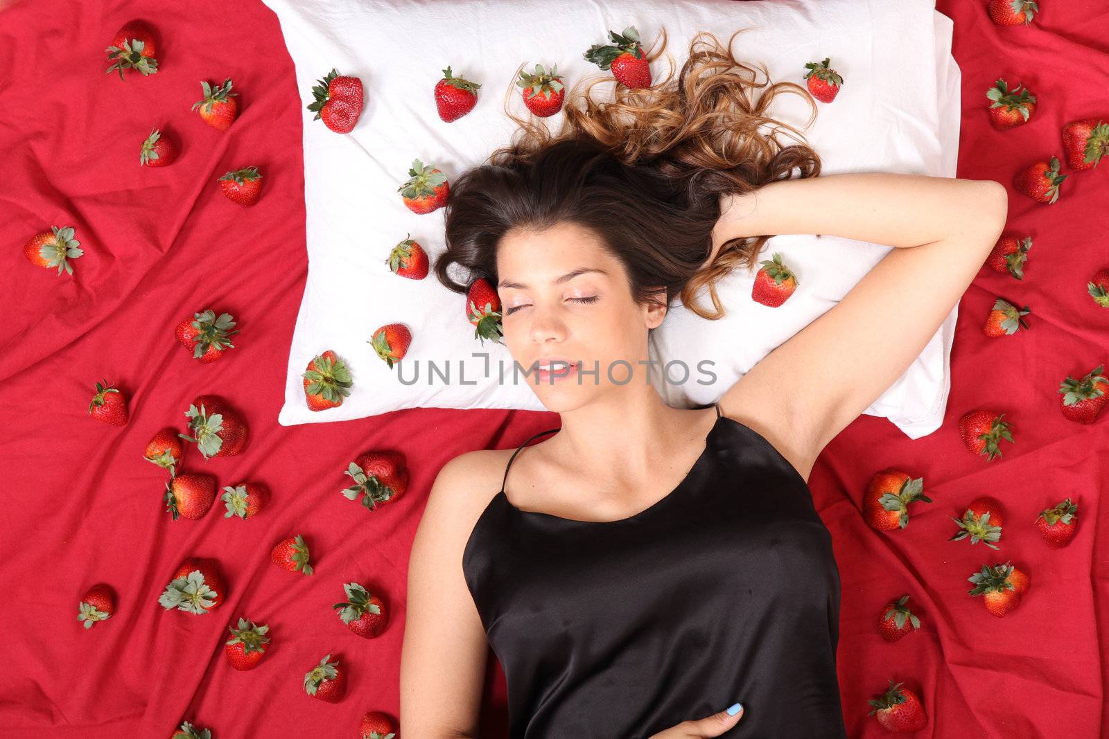 A young adult american woman dreaming of strawberries.