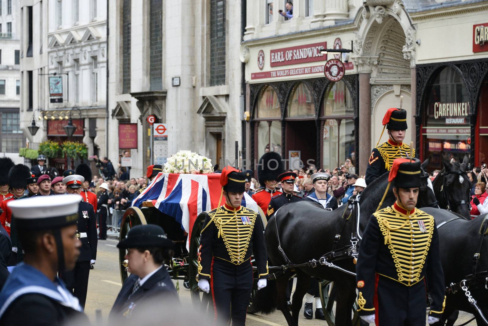 London, UK. April 17th, 2013. Baroness Thatcher's coffin is carried on a gun carriage on its way to St Paul's Cathedral.