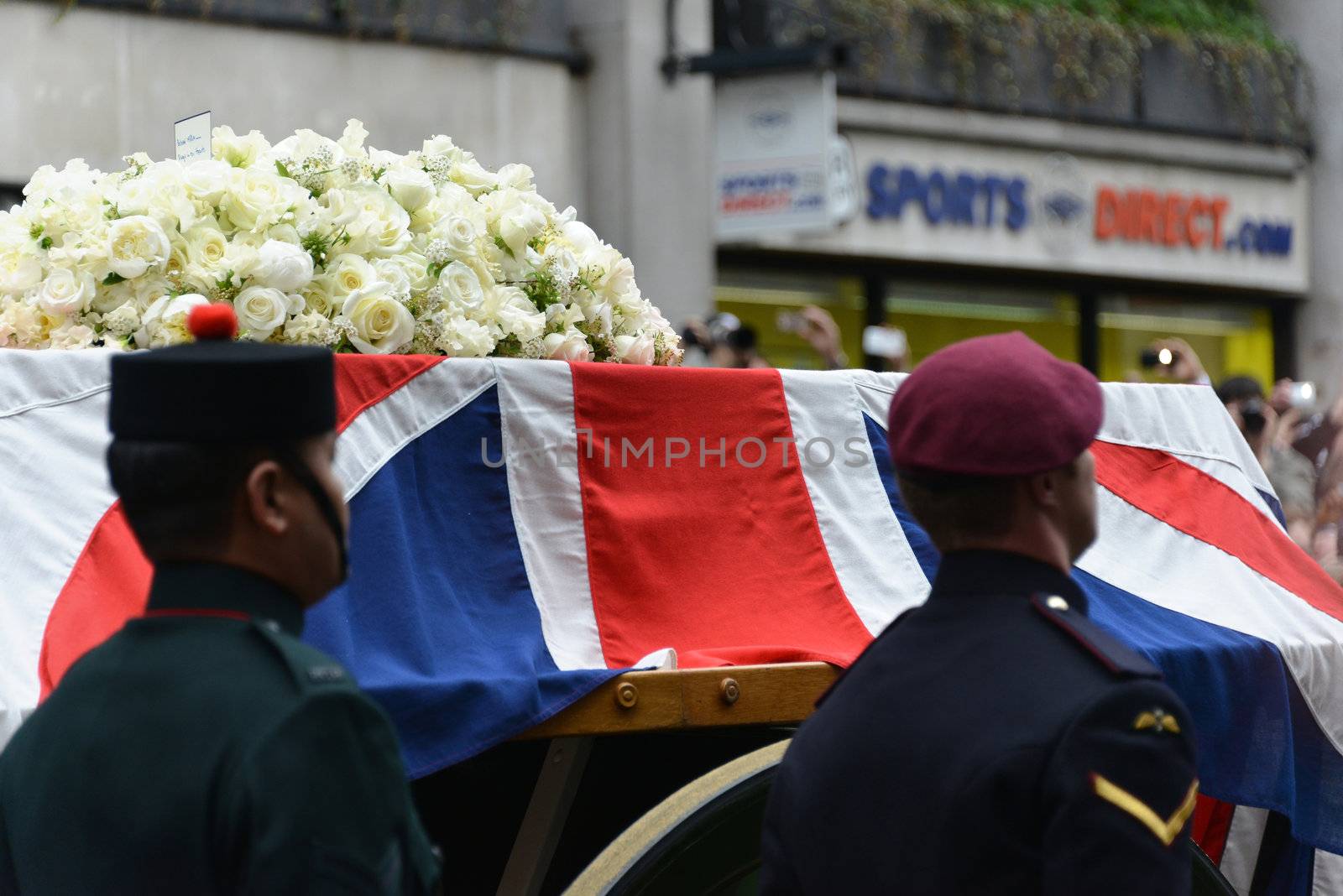 London, UK. April 17th, 2013. Baroness Thatcher's coffin is carried on a gun carriage on its way to St Paul's Cathedral.