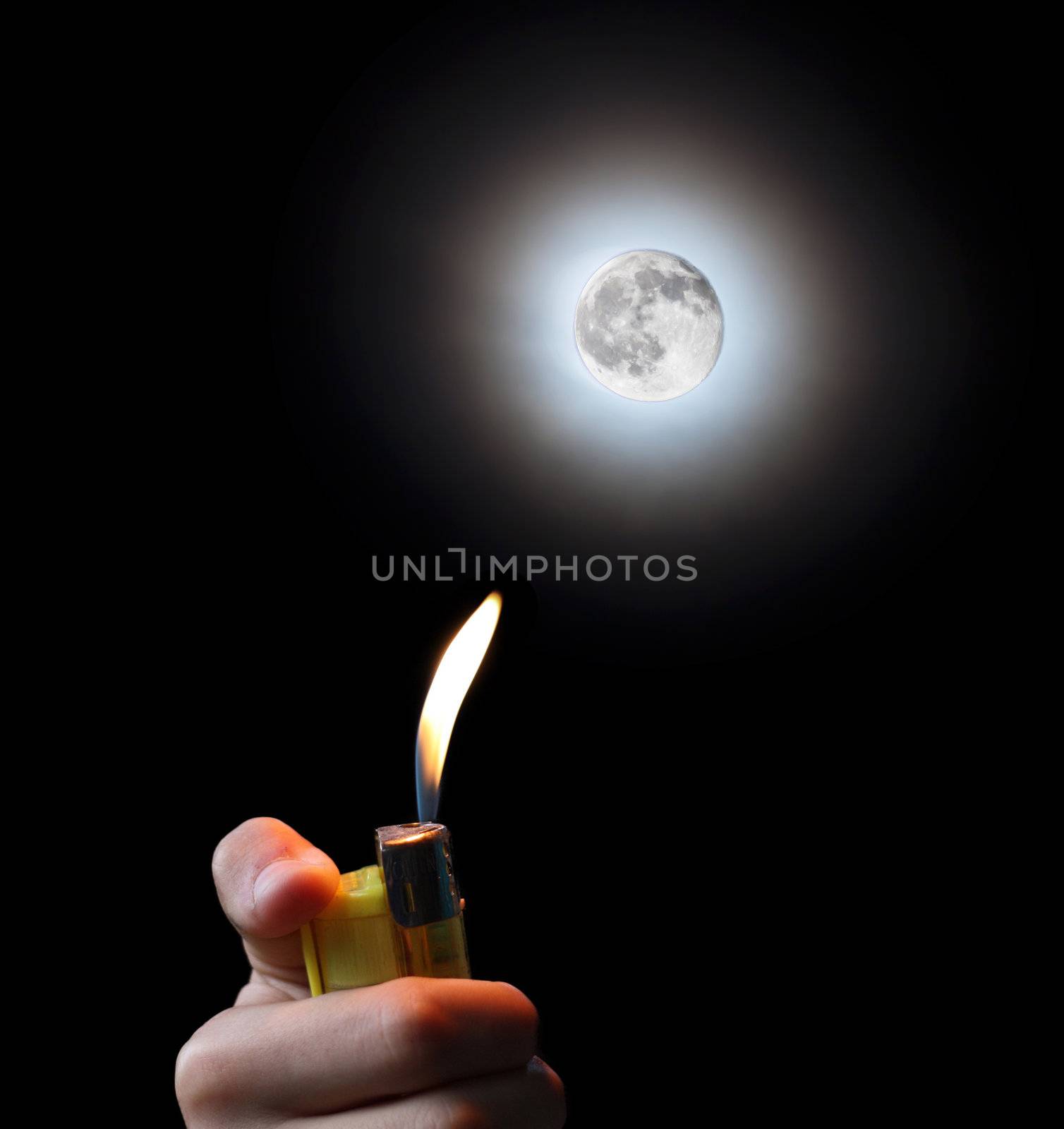 hand with a cigarette lighter and the moon