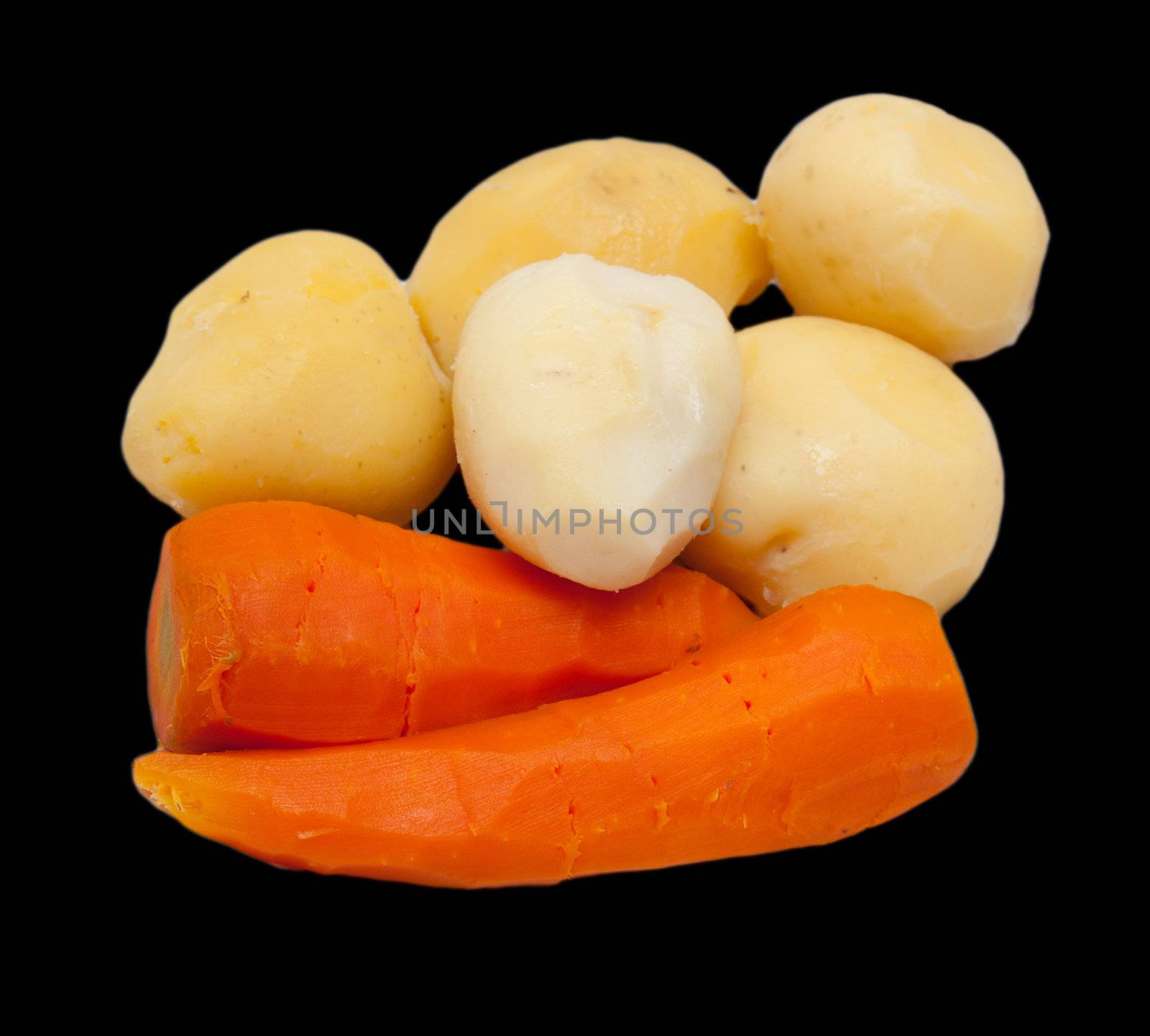 boiled potatoes and carrots on a black background by schankz