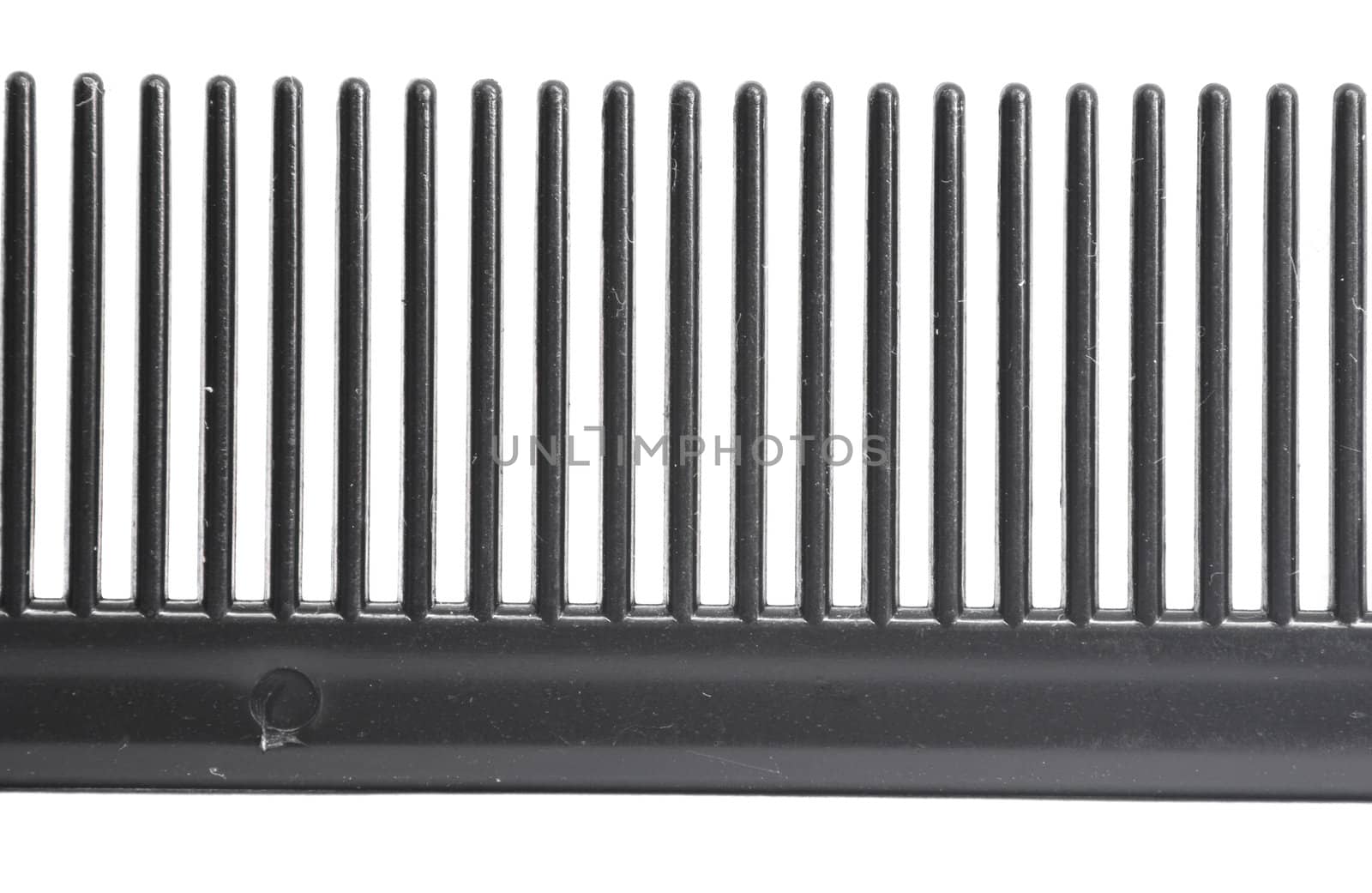 teeth of the comb close