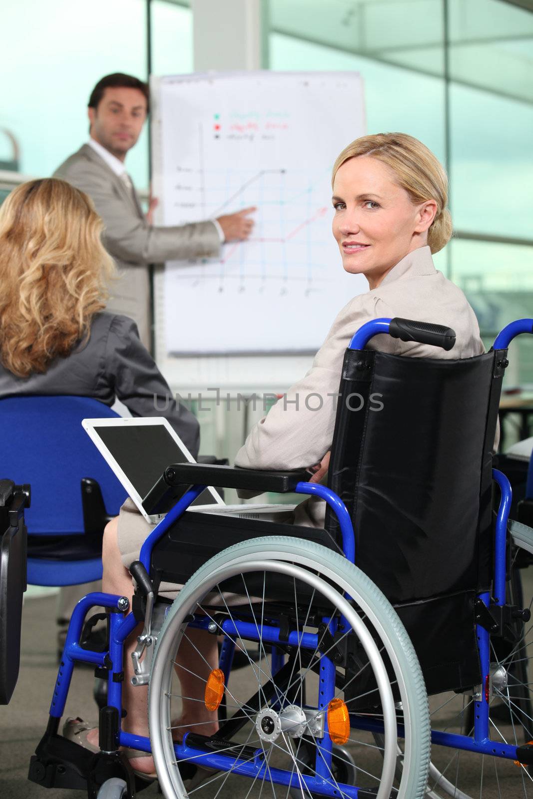 Bussinesswoman in wheelchair by phovoir