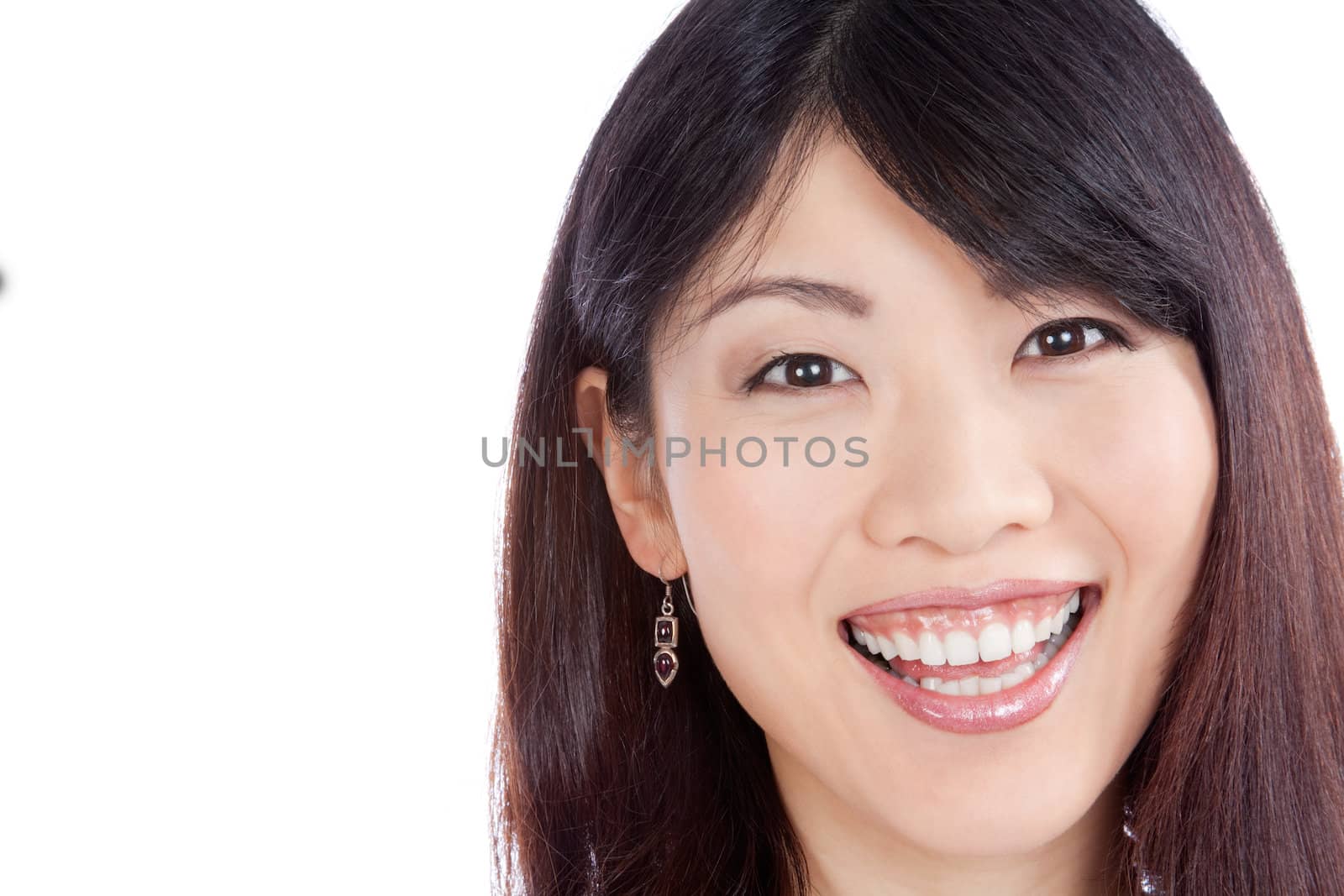 Beautiful smiling asian woman isolated on white background.