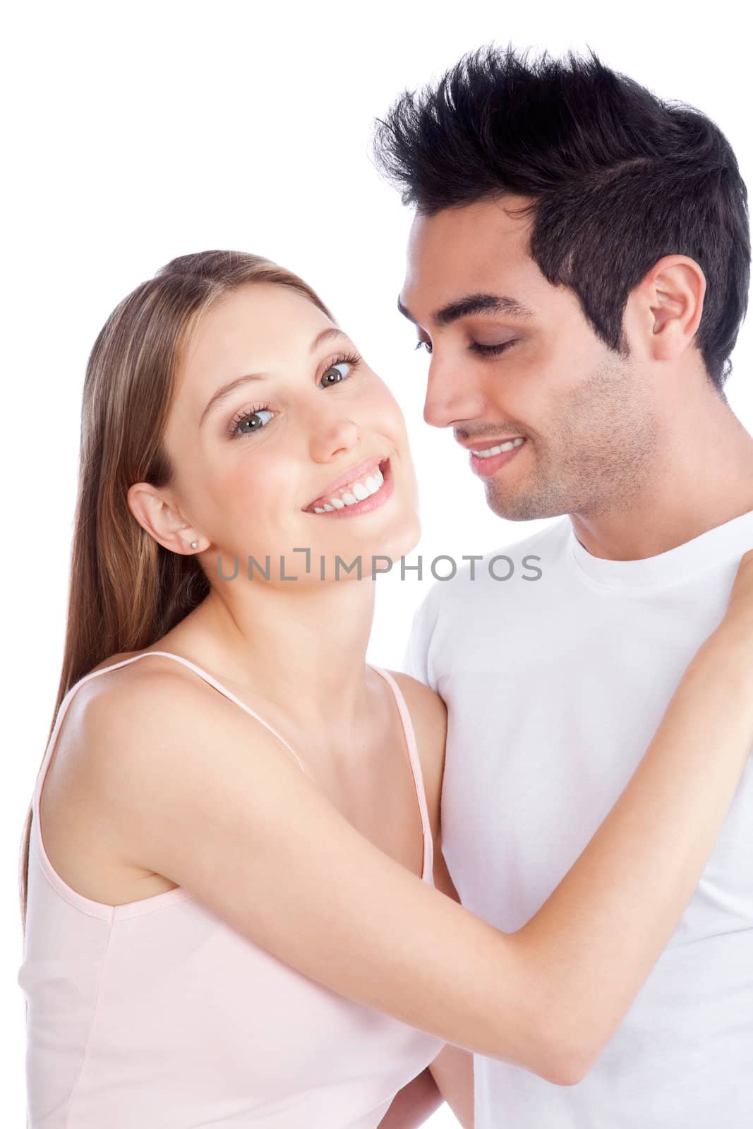 Portrait of diverse young couple isolated on white background.