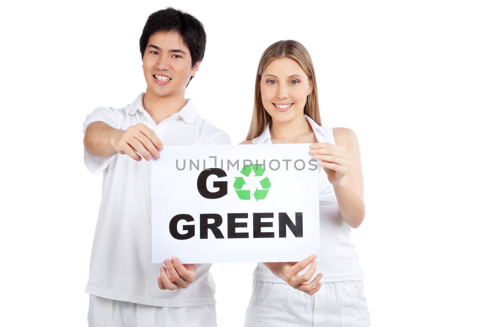 Portrait of young happy couple holding blank placard.